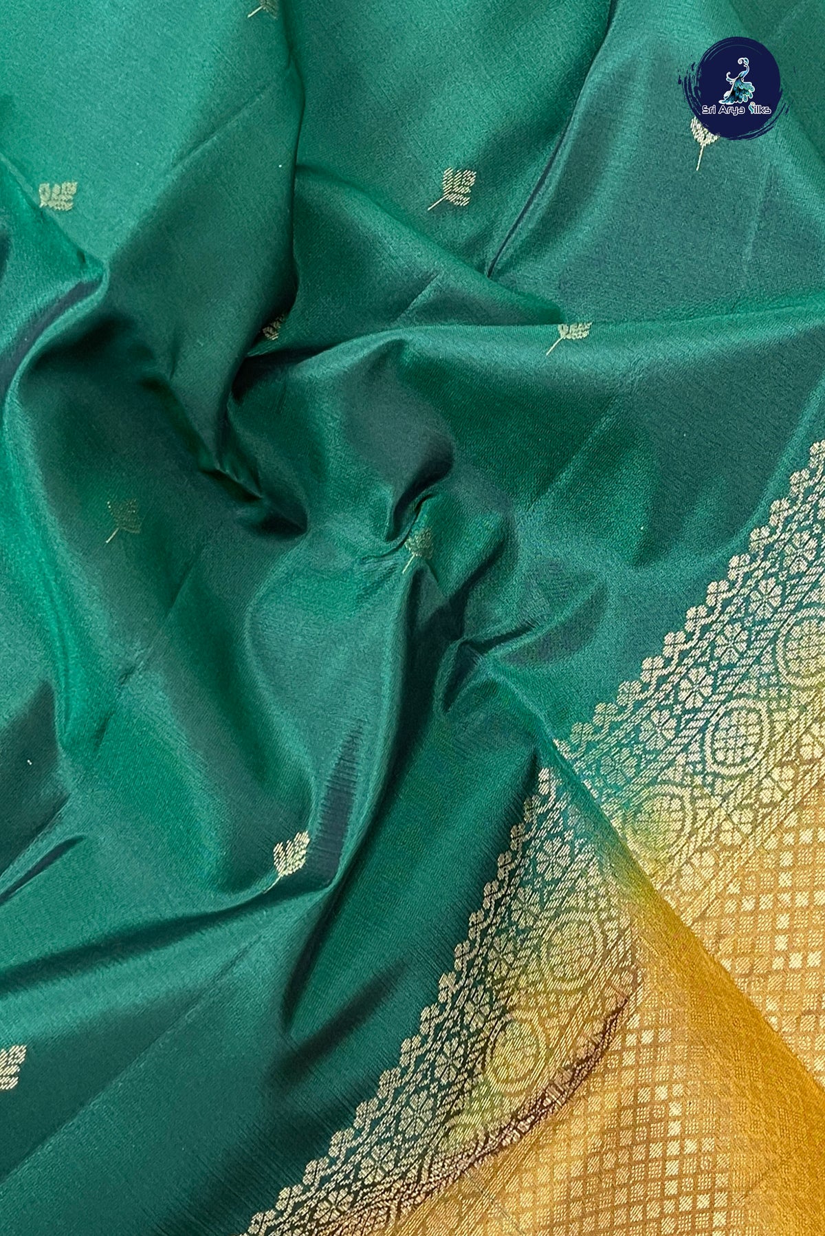 Dark Green Half Pure Silk Saree With Zari Buttas Pattern