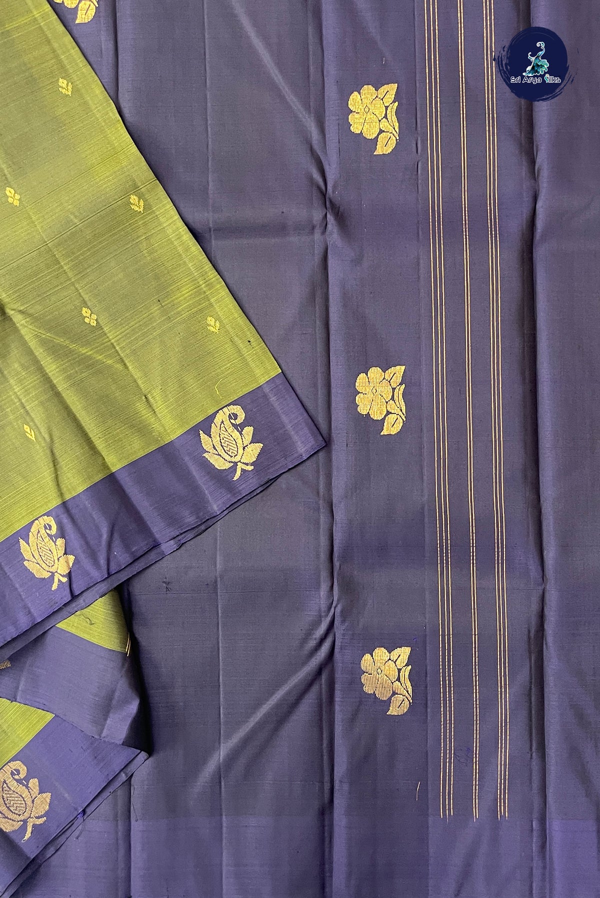 Olive Green Light Weight Silk Saree With Zari Buttas Pattern