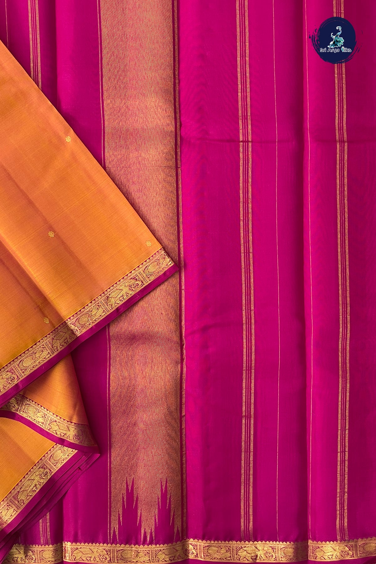 Pinkish Orange Light Weight Silk Saree With Zari Buttas Pattern