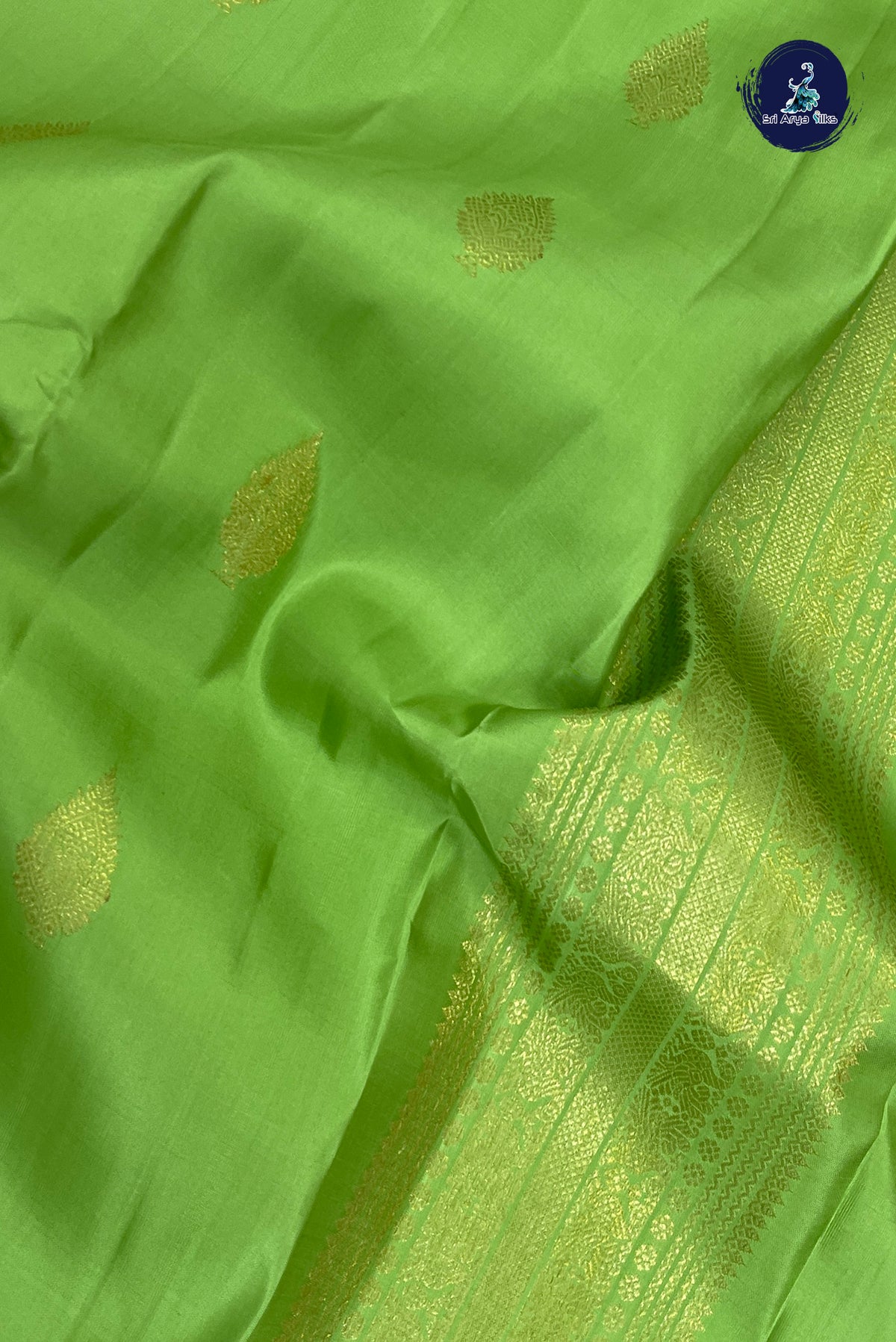 Pista Green Bridal Silk Saree With Zari Buttas Pattern