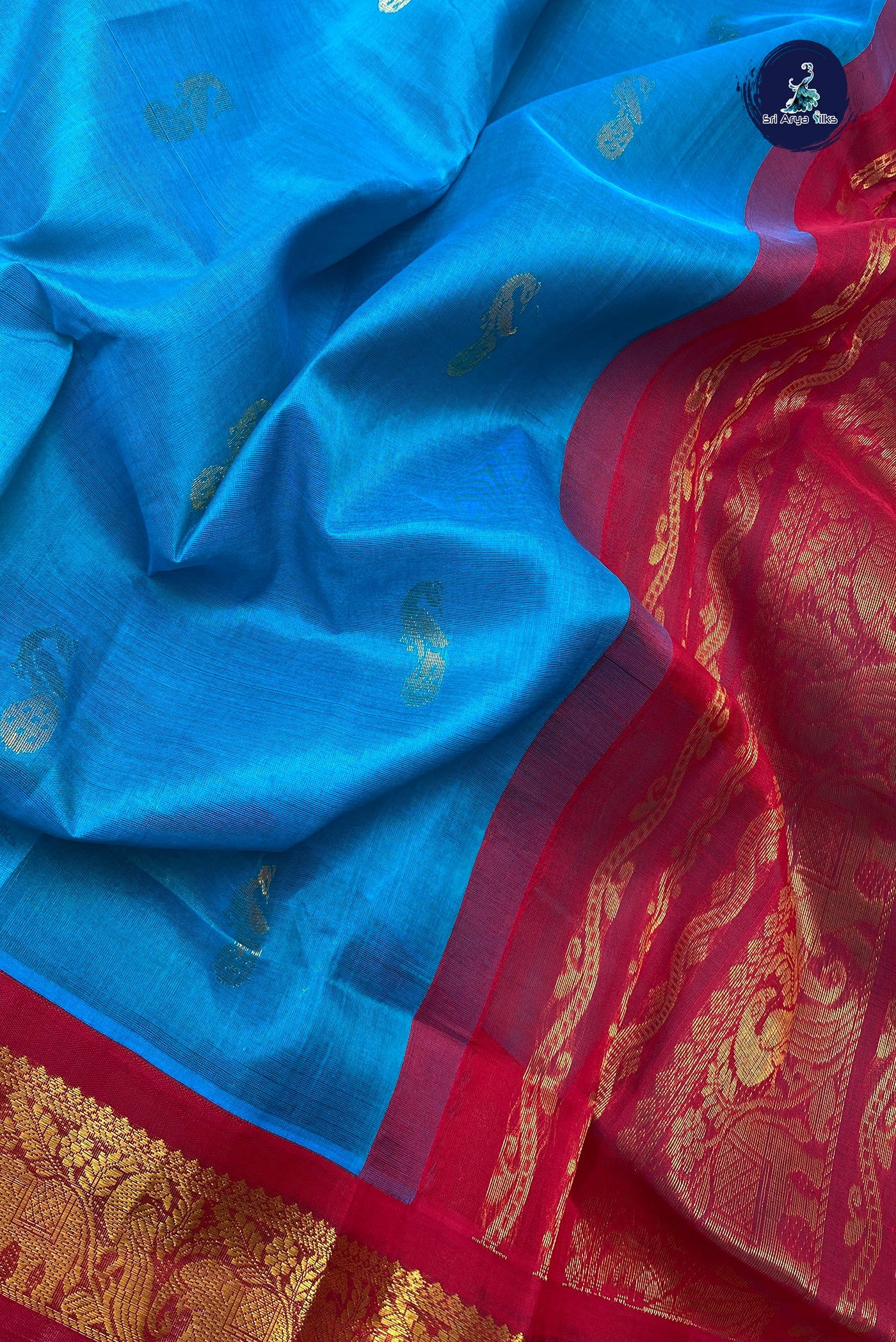 Turquoise Silk Cotton Saree With Zari Buttas Pattern