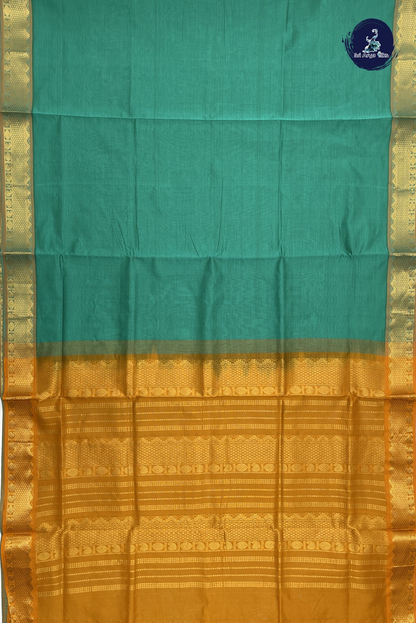 Sea Green Semi Silk Cotton Saree With Plain Pattern