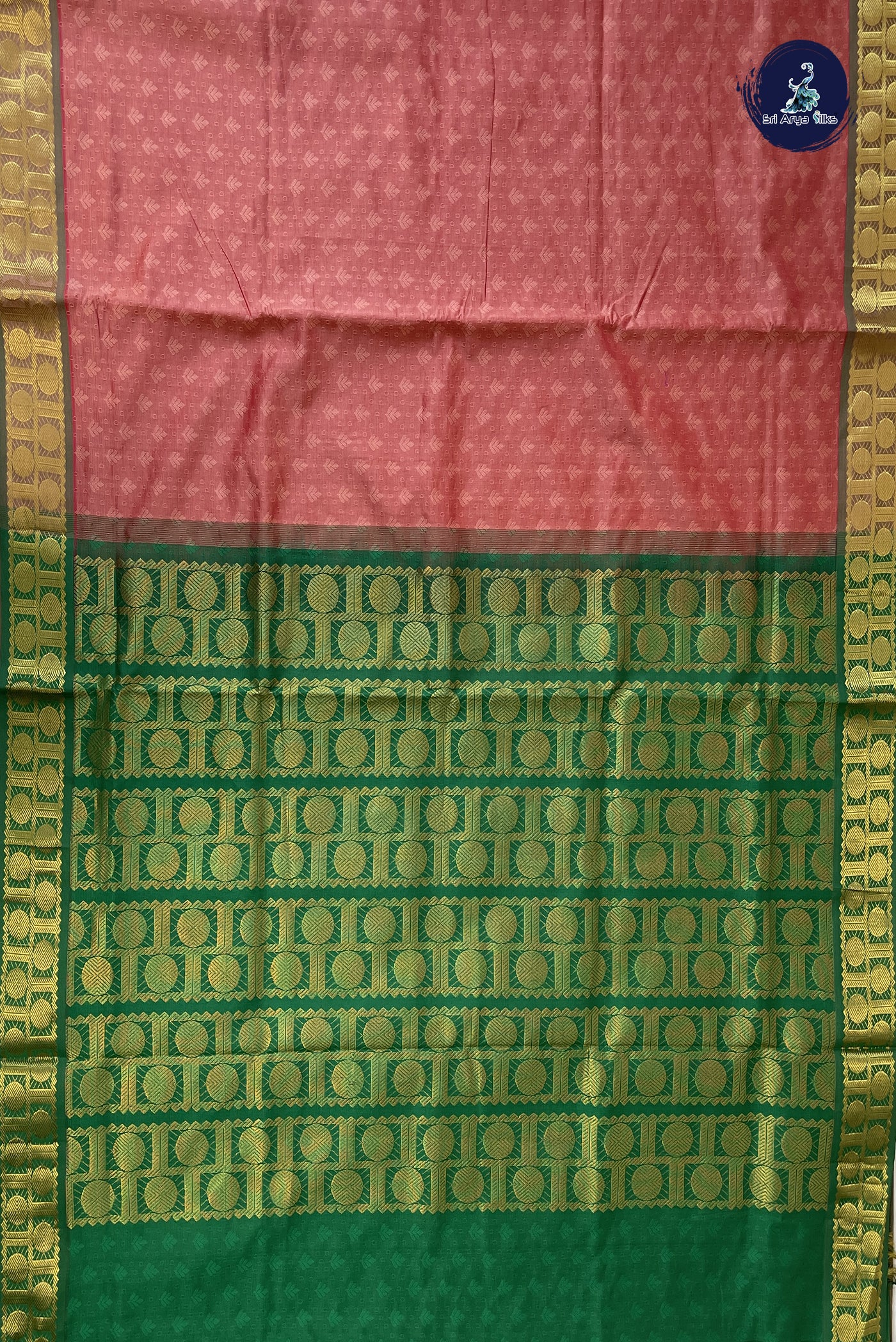 Light Peach Semi Silk Cotton Saree With Embossed Pattern