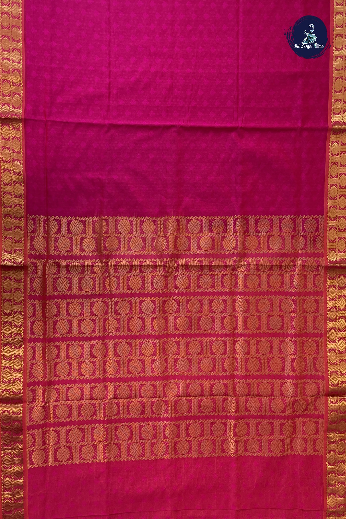 Rani Pink Semi Silk Cotton Saree With Embossed Pattern