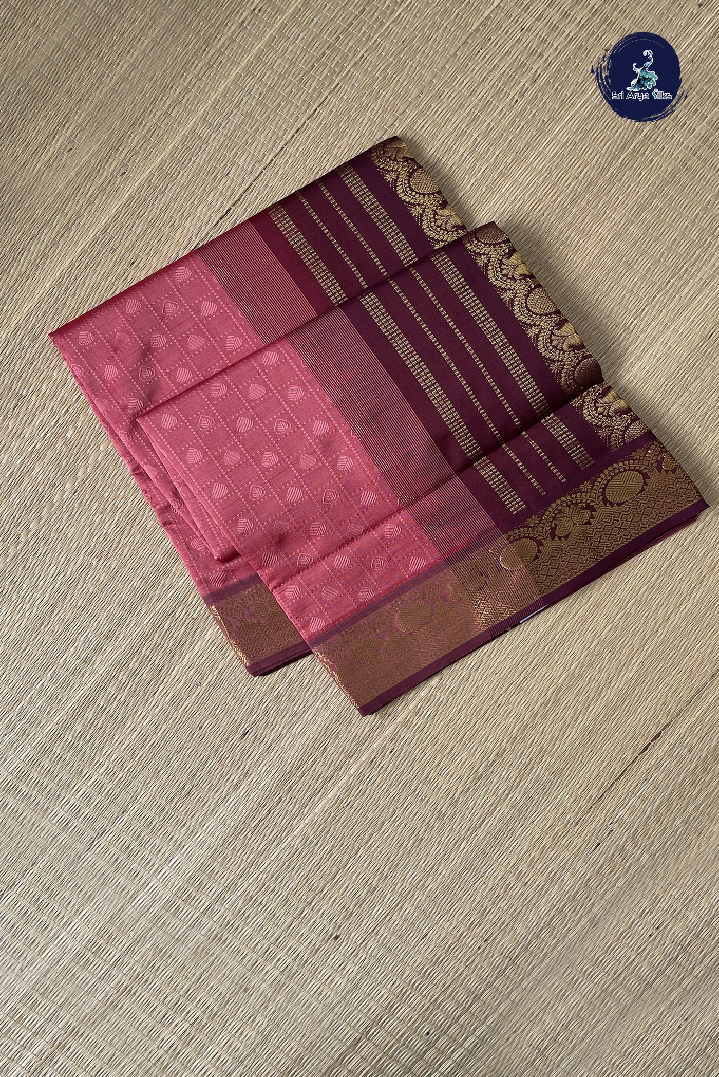 Peach Pink Simple Silk Cotton Saree With Embossed Pattern