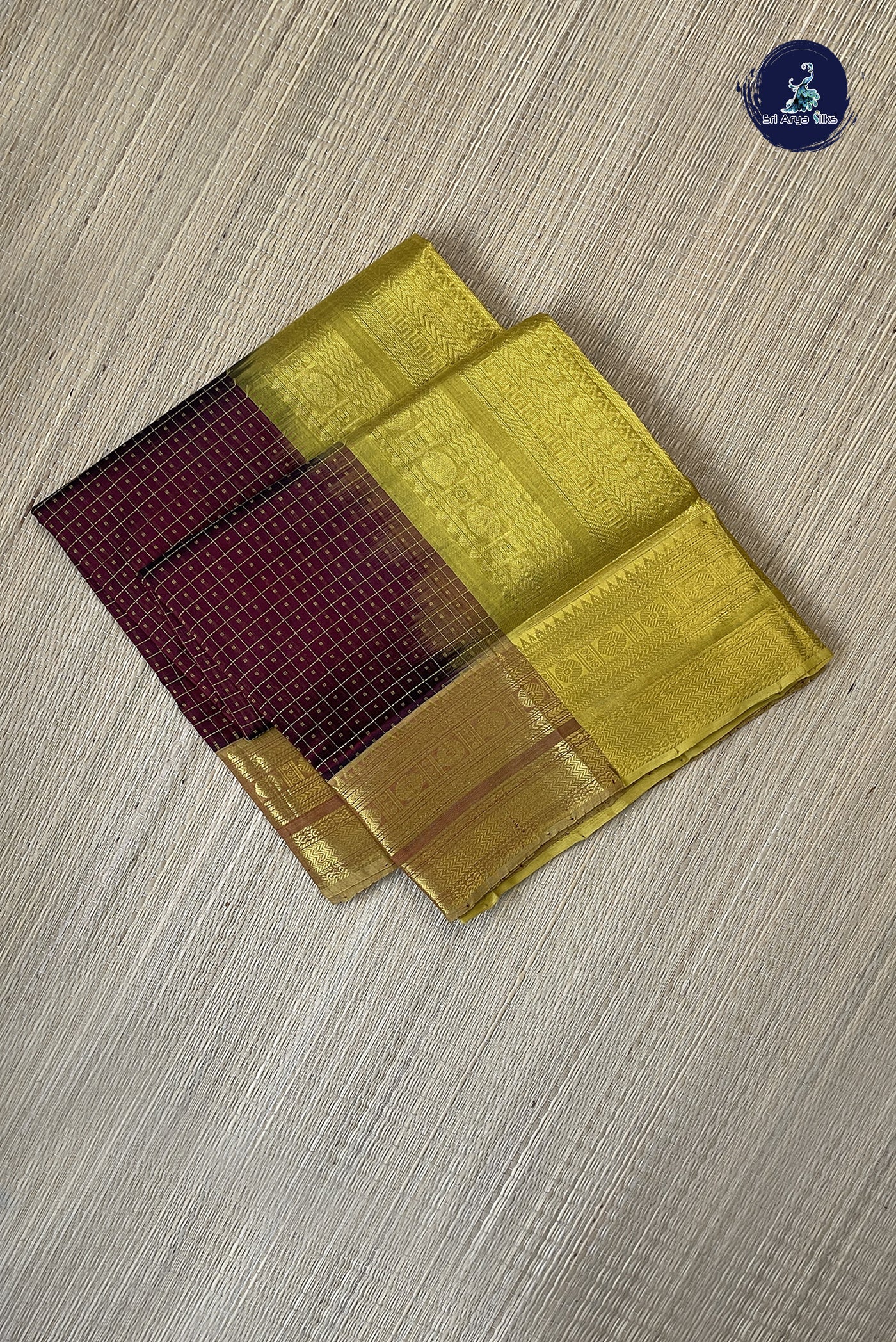 Brown Checked Saree With Laksha Deepam Design Pattern