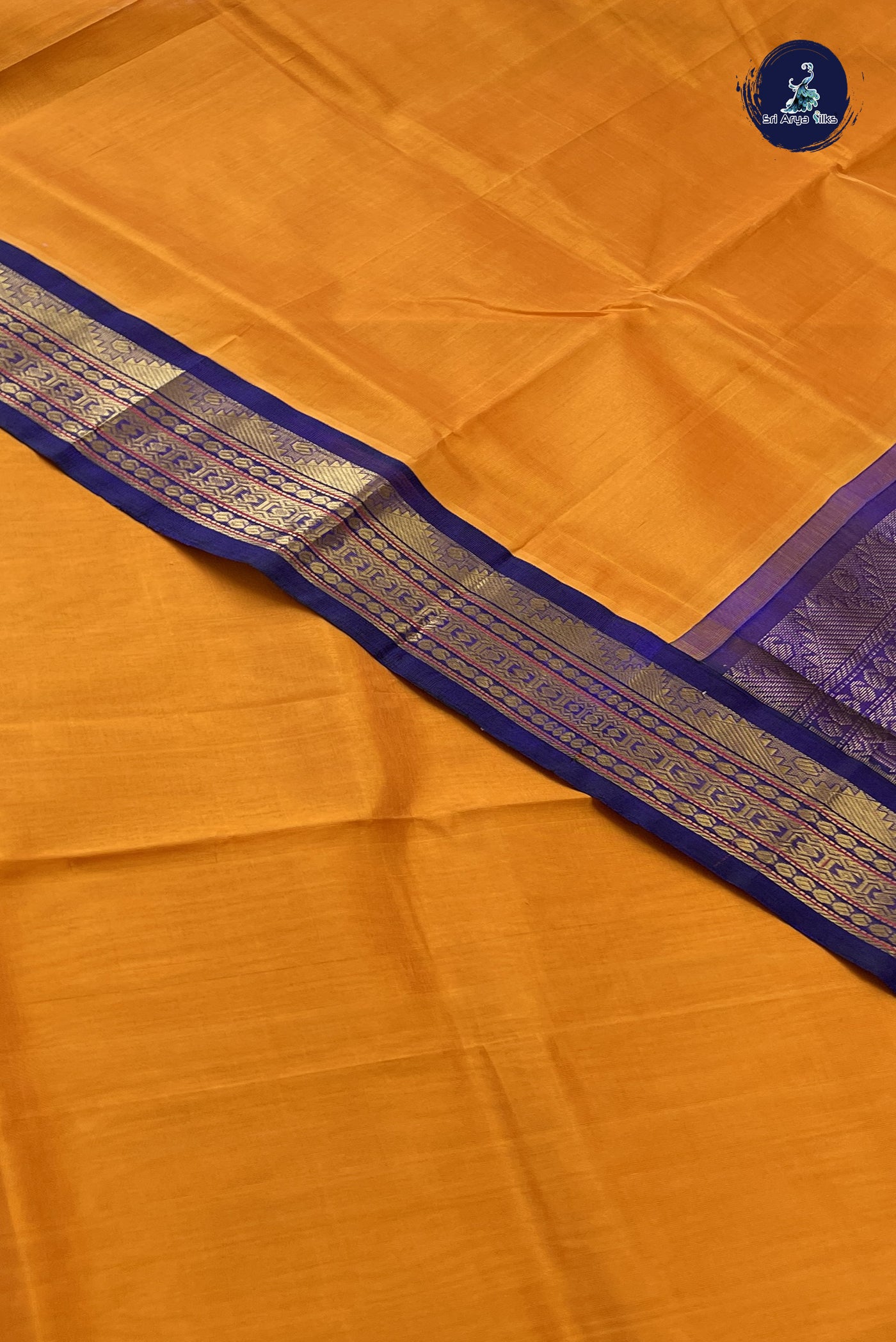 Yellowish Orange Korvai Silk Cotton Saree With Plain Pattern