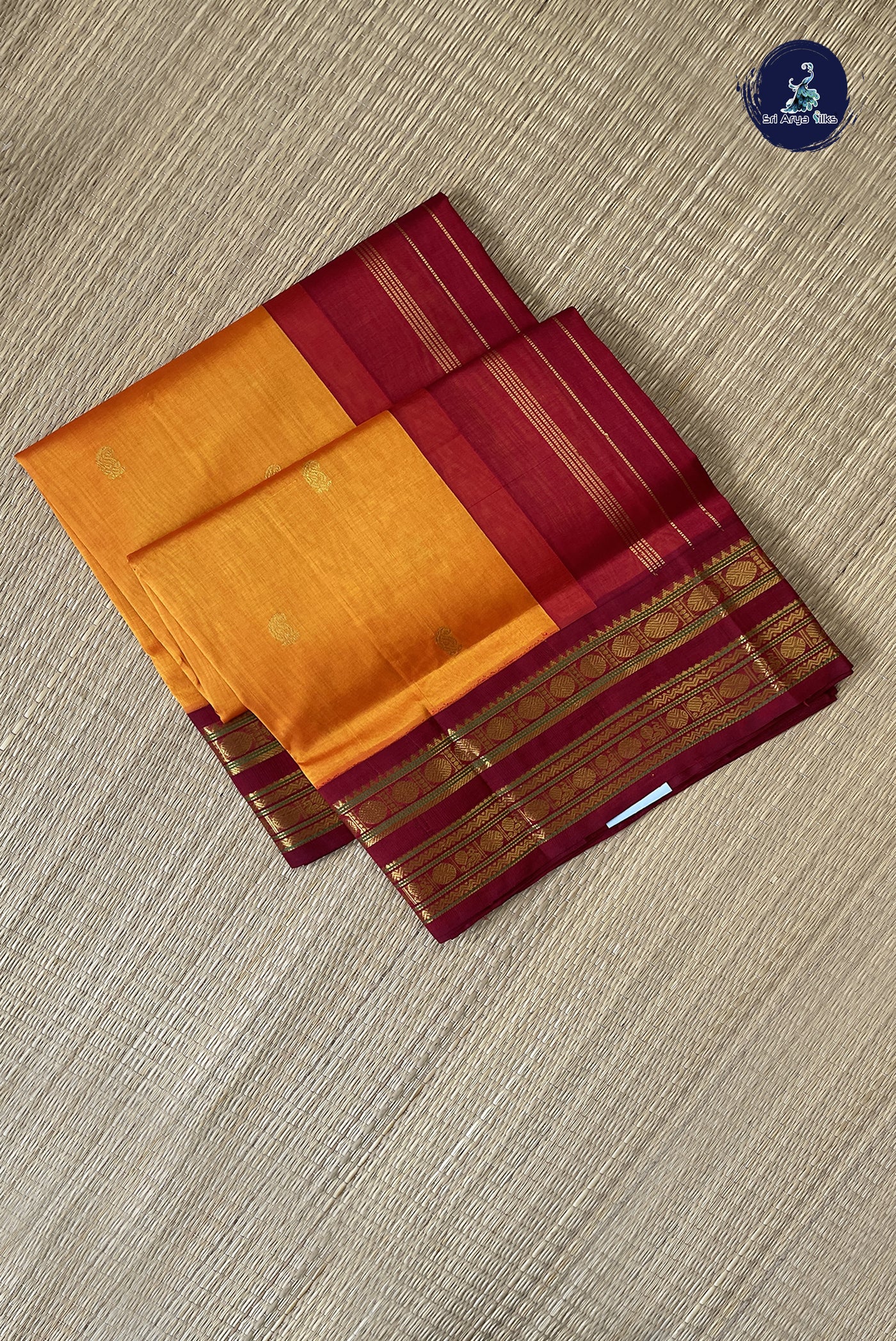 Yellowish Orange Korvai Silk Cotton Saree With Zari Buttas Pattern