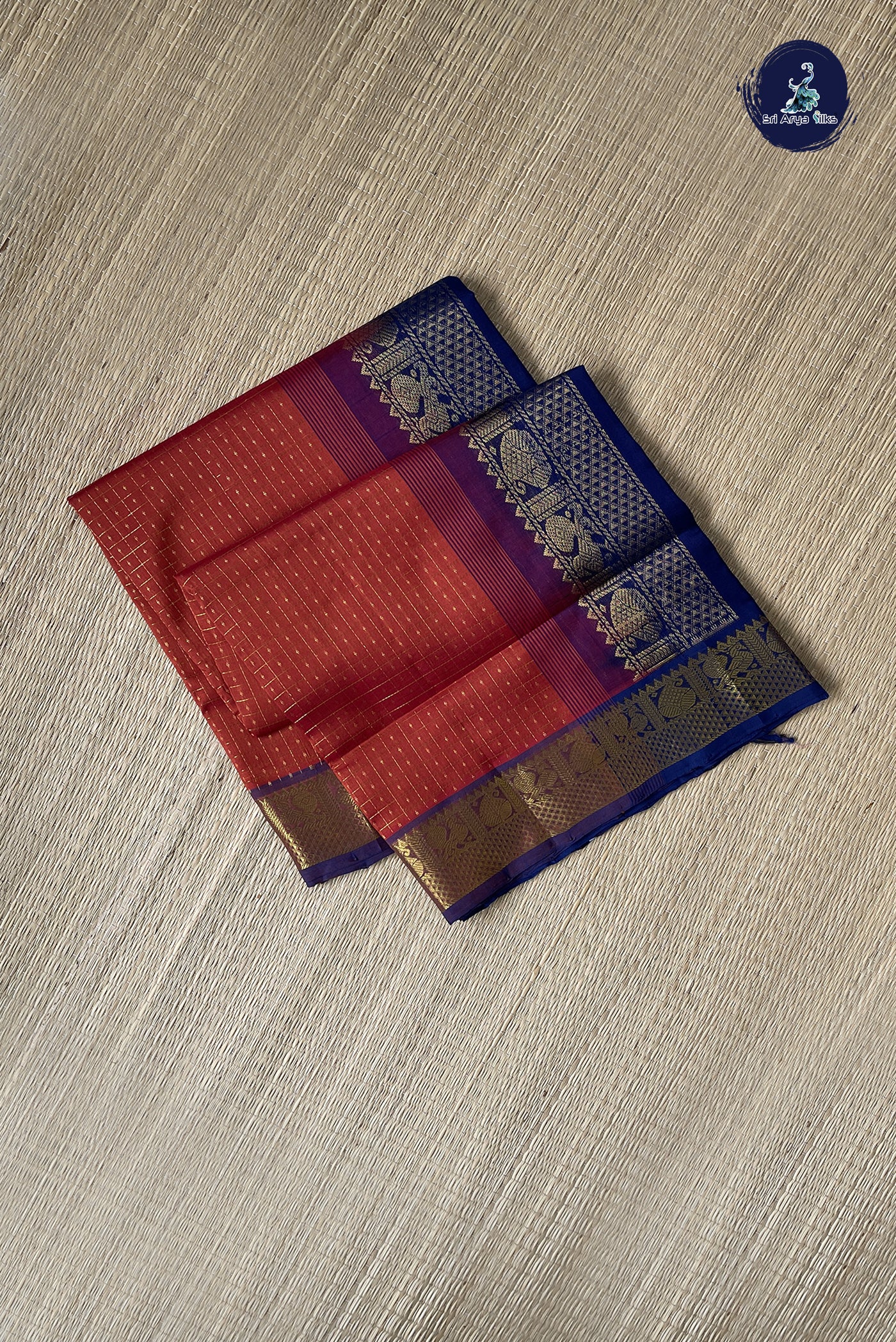 Rust Checked Saree With Laksha Deepam Design Pattern