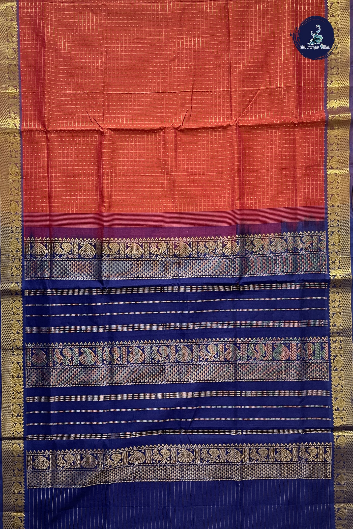 Rust Checked Saree With Laksha Deepam Design Pattern