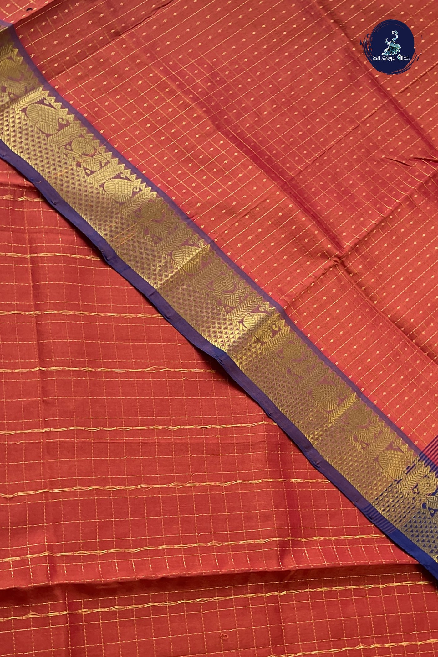 Rust Checked Saree With Laksha Deepam Design Pattern