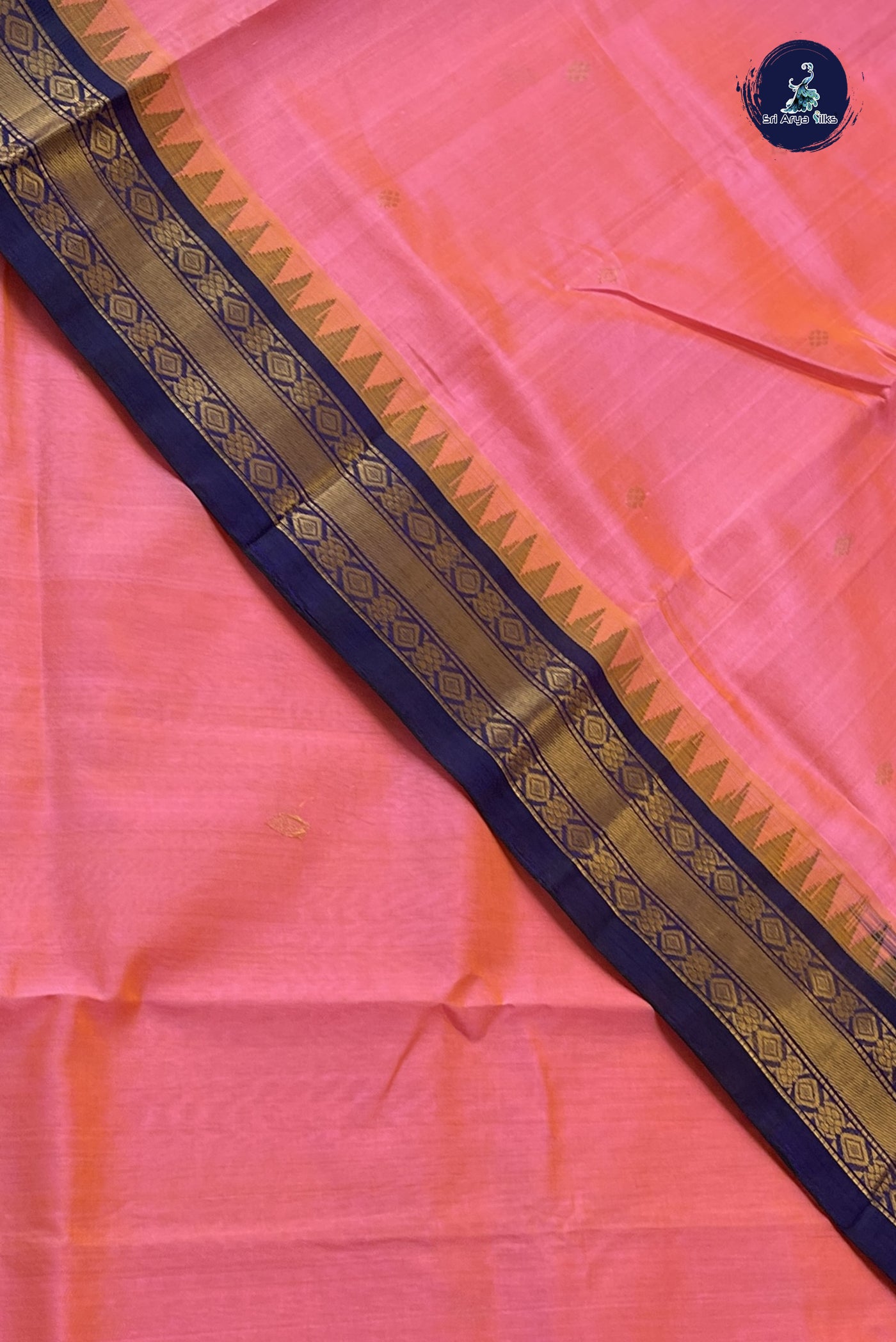 Pinkish Orange Korvai Silk Cotton Saree With Zari Buttas Pattern