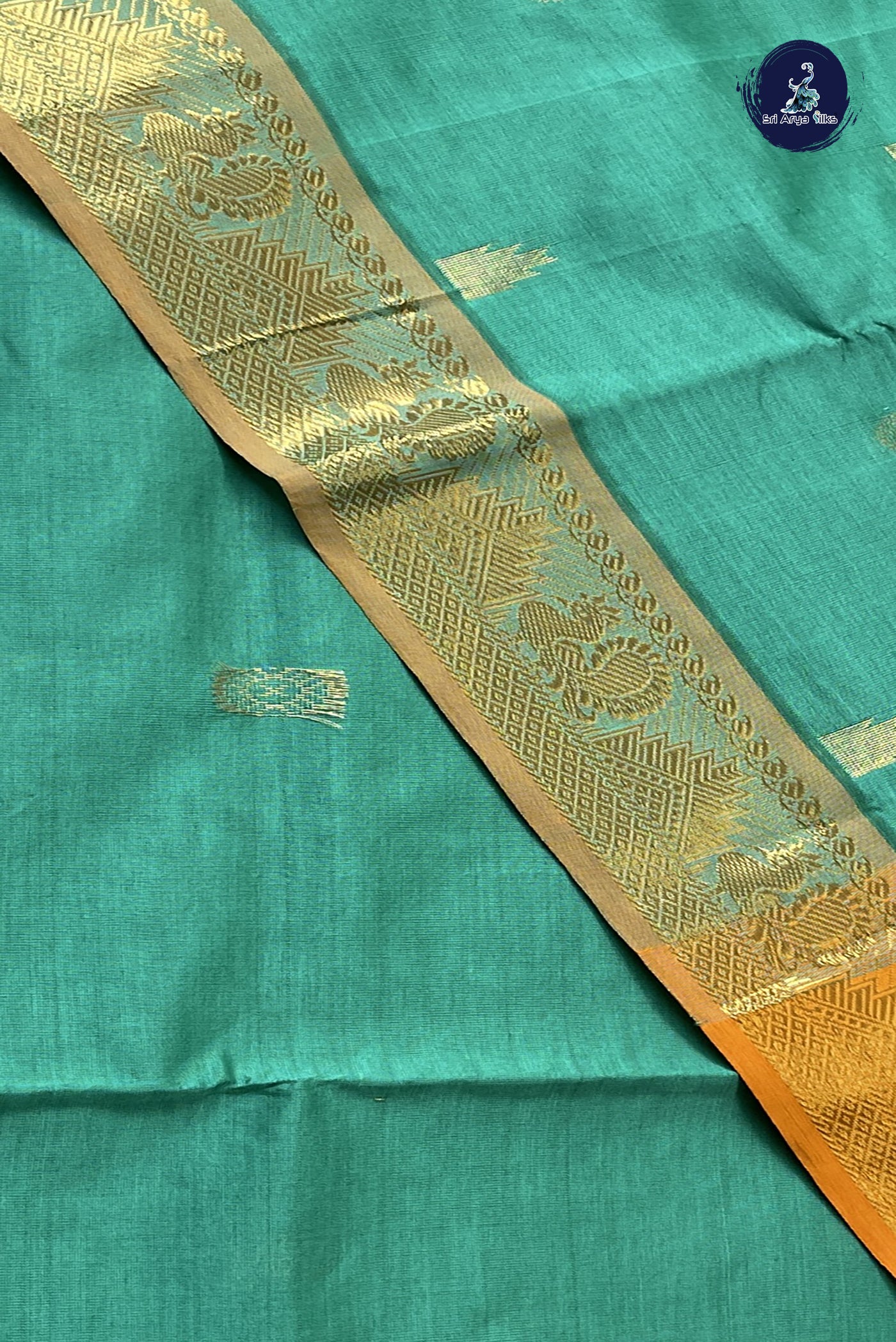 Sea Green Simple Silk Cotton Saree With Zari Buttas Pattern