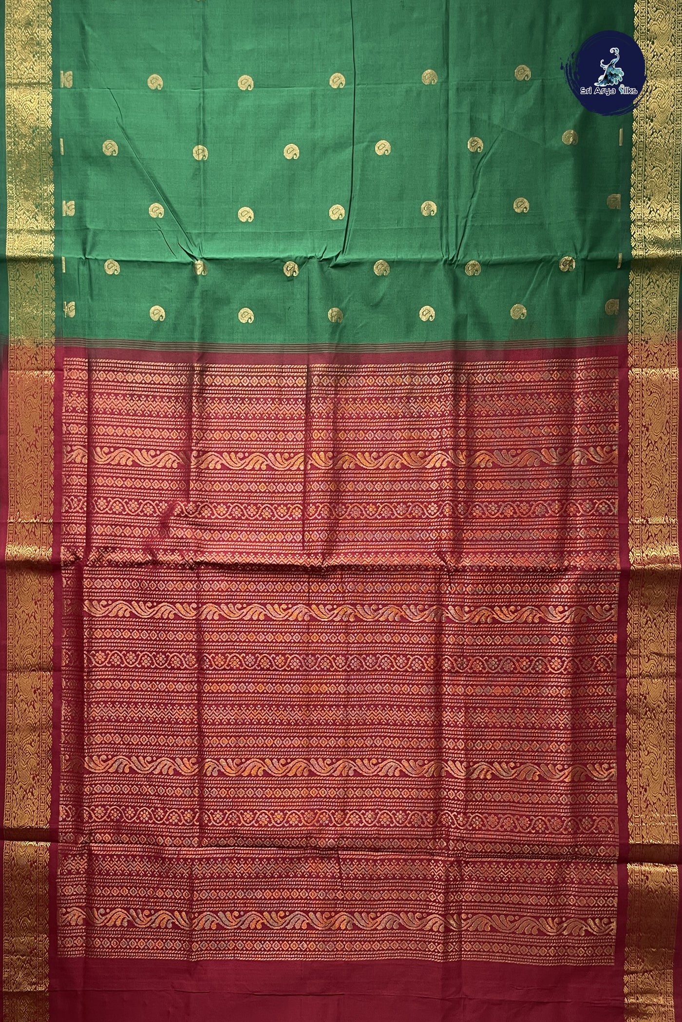 Bottle Green Simple Silk Cotton Saree With Zari Buttas Pattern