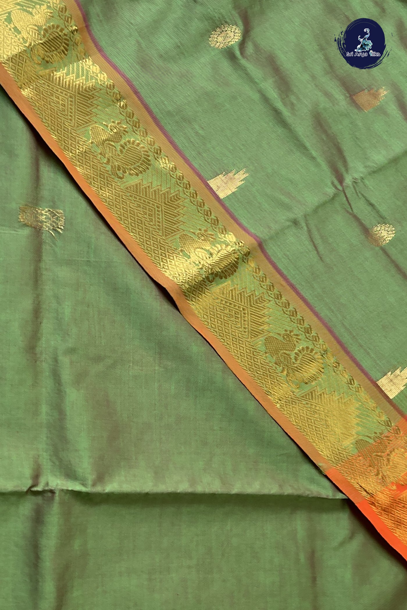 Pastel Green Simple Silk Cotton Saree With Zari Buttas Pattern