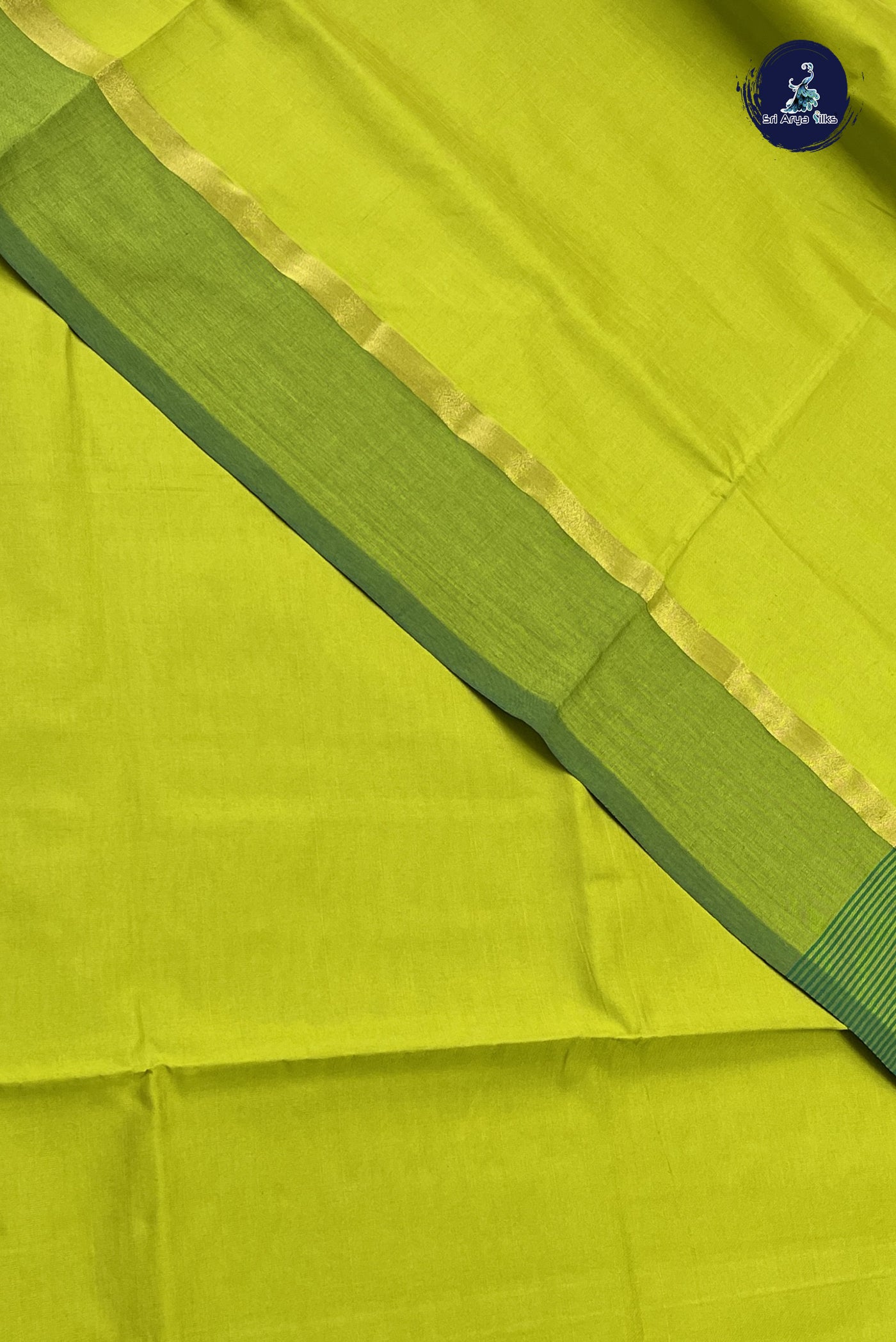 Light Green Semi Silk Cotton Saree With Plain Pattern