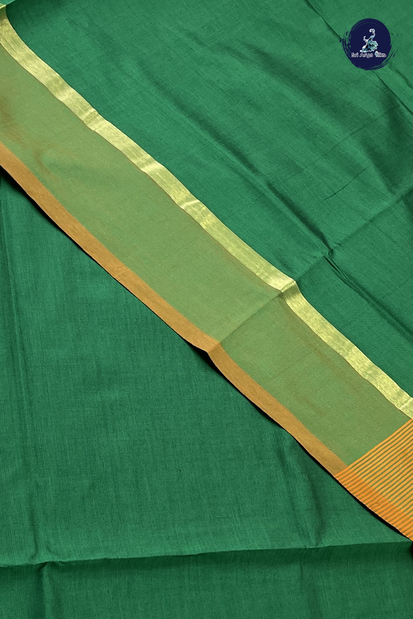 Dark Green Semi Silk Cotton Saree With Plain Pattern