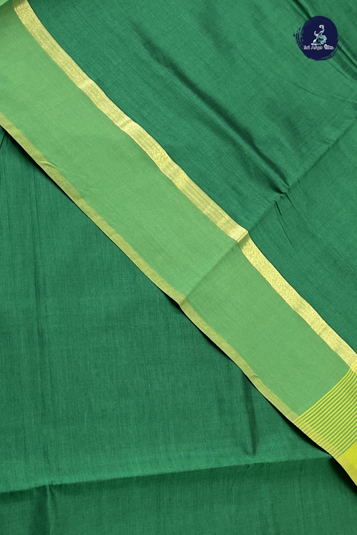 Dark Green Semi Silk Cotton Saree With Plain Pattern