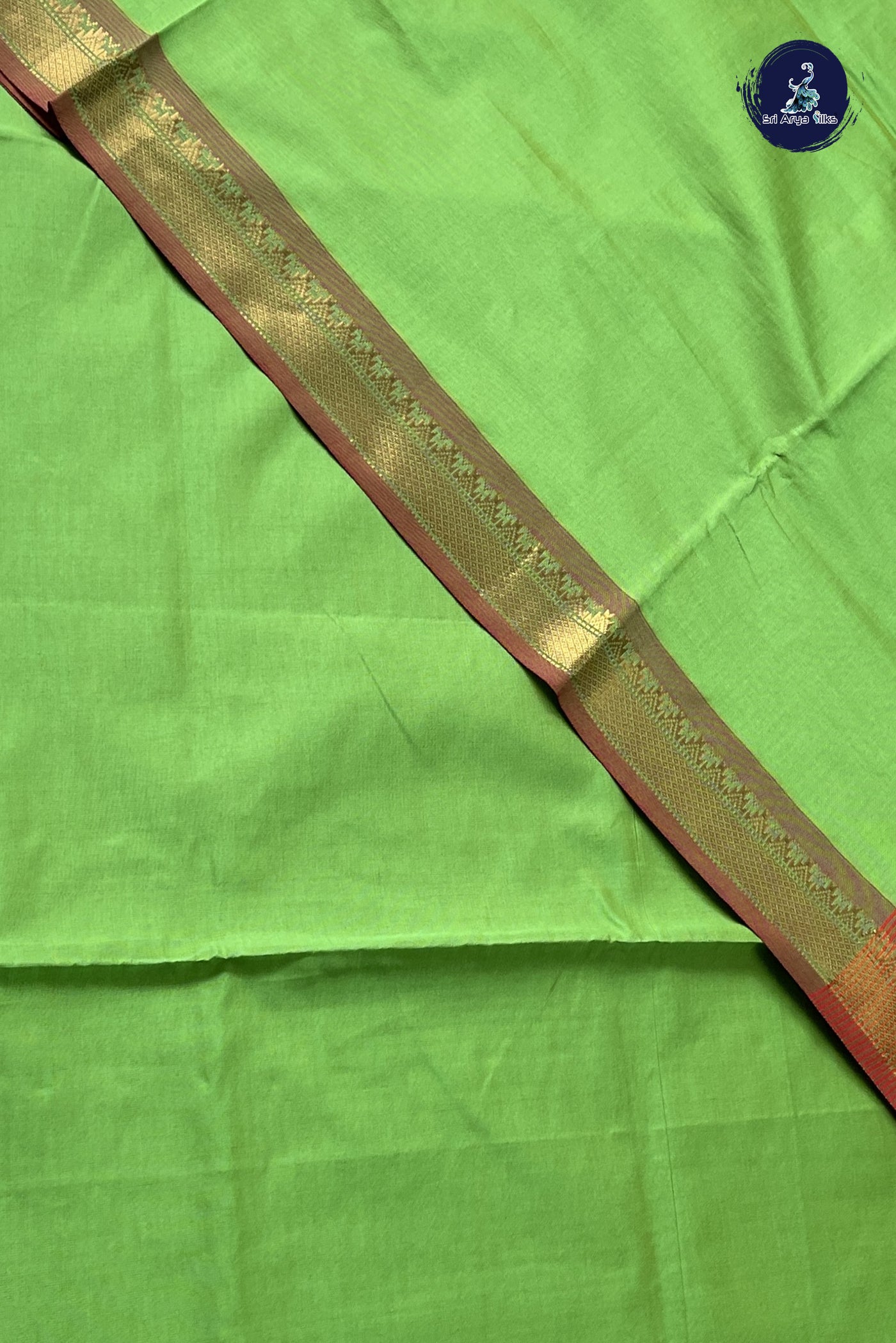 Light Green Semi Silk Cotton Saree With Plain Pattern