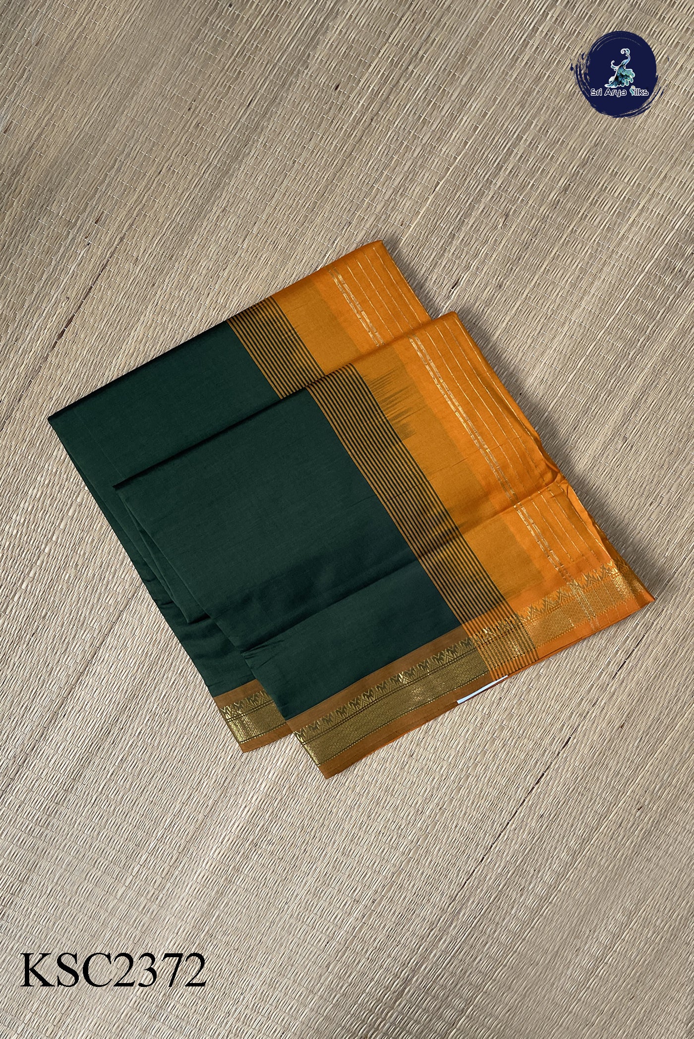 Dark Green Semi Silk Cotton Saree With Plain Pattern