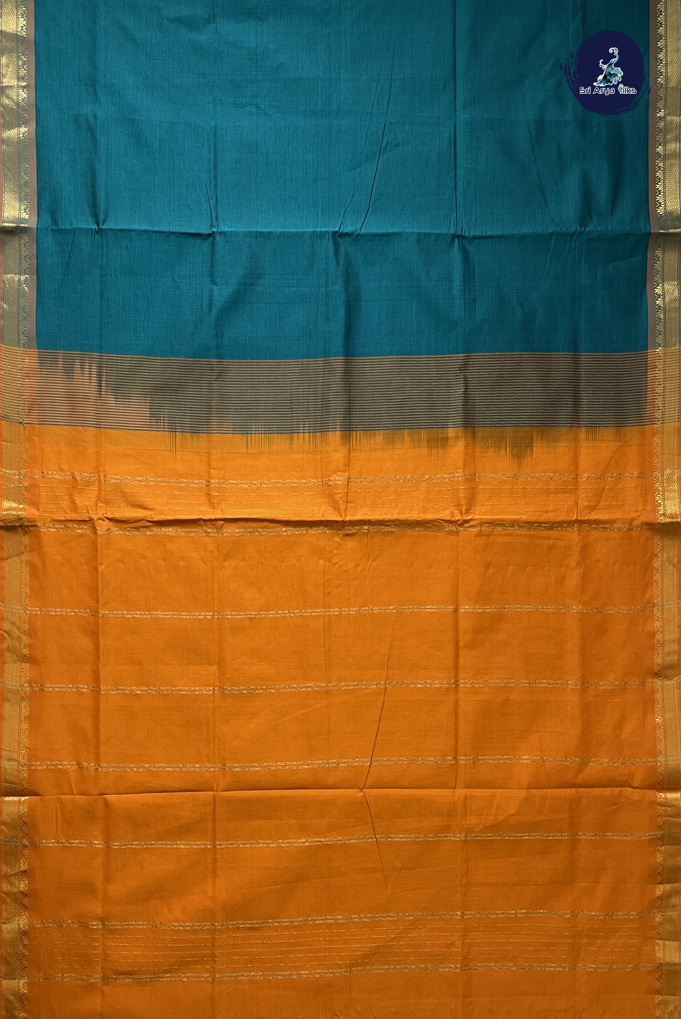 Sapphire Green Semi Silk Cotton Saree With Plain Pattern