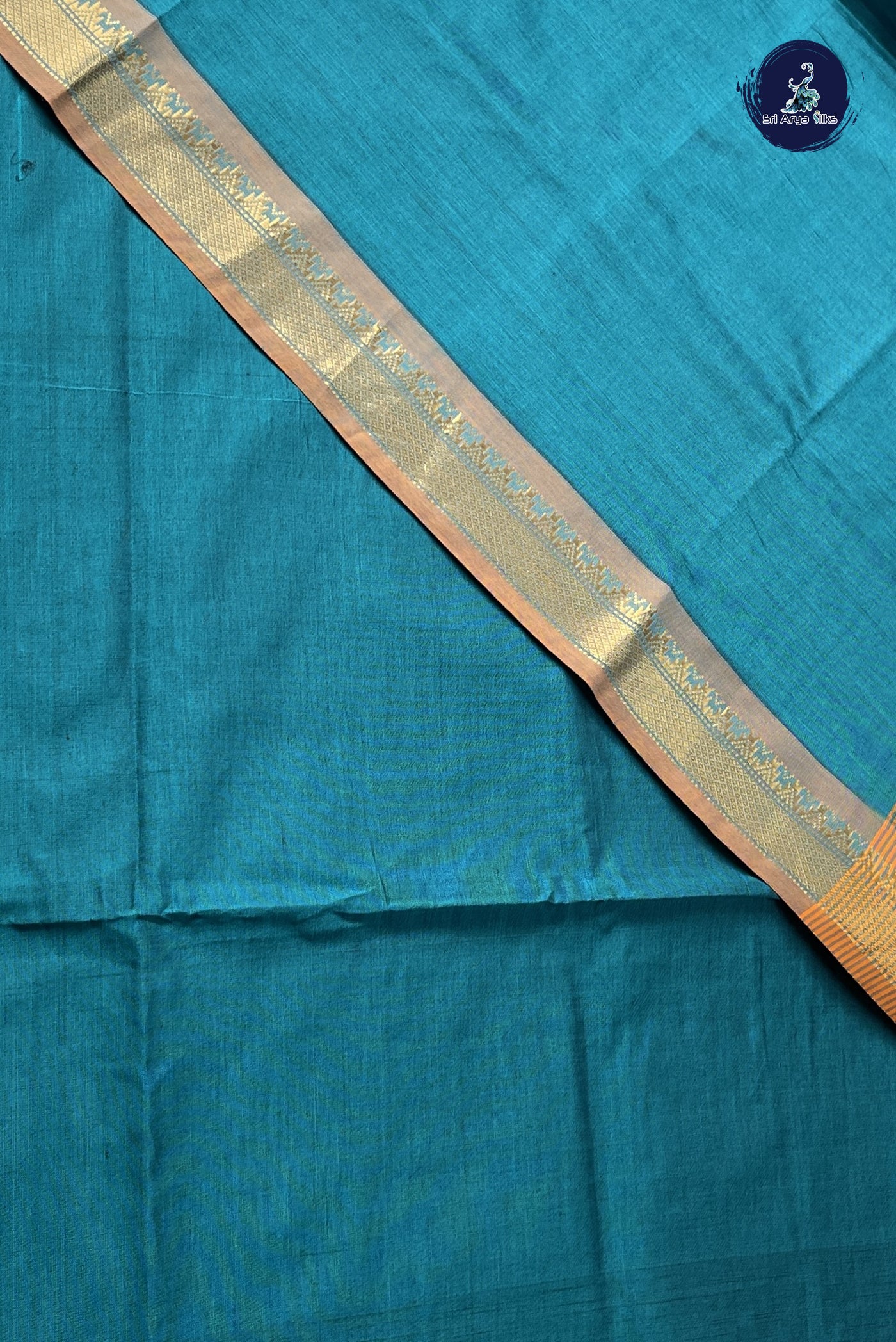 Sapphire Green Semi Silk Cotton Saree With Plain Pattern