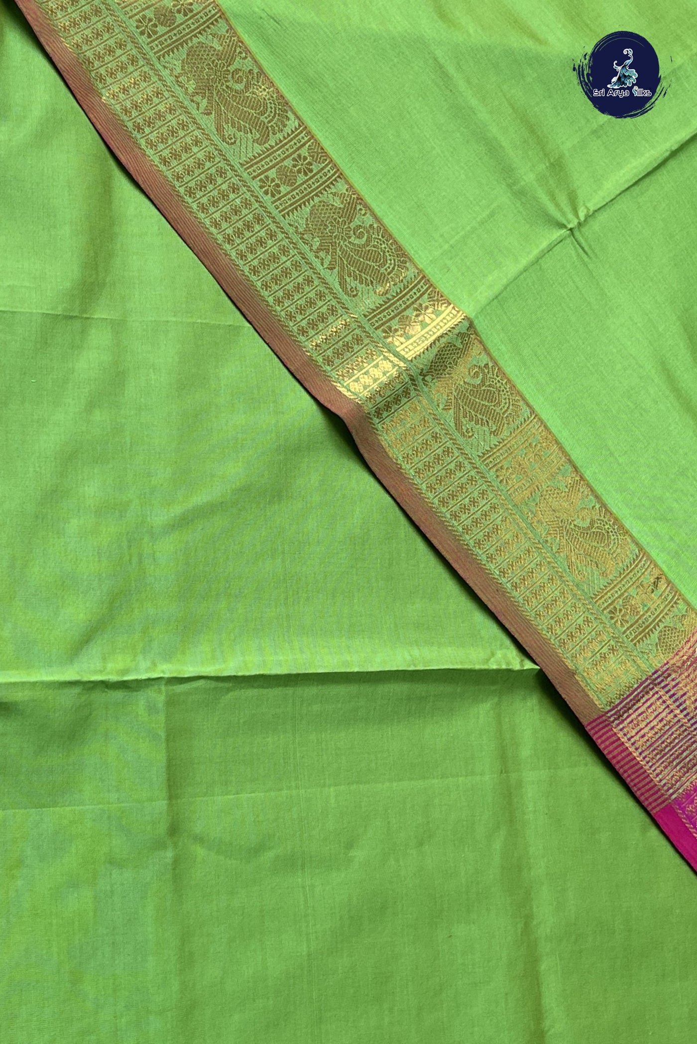 Light Green Semi Silk Cotton Saree With Plain Pattern