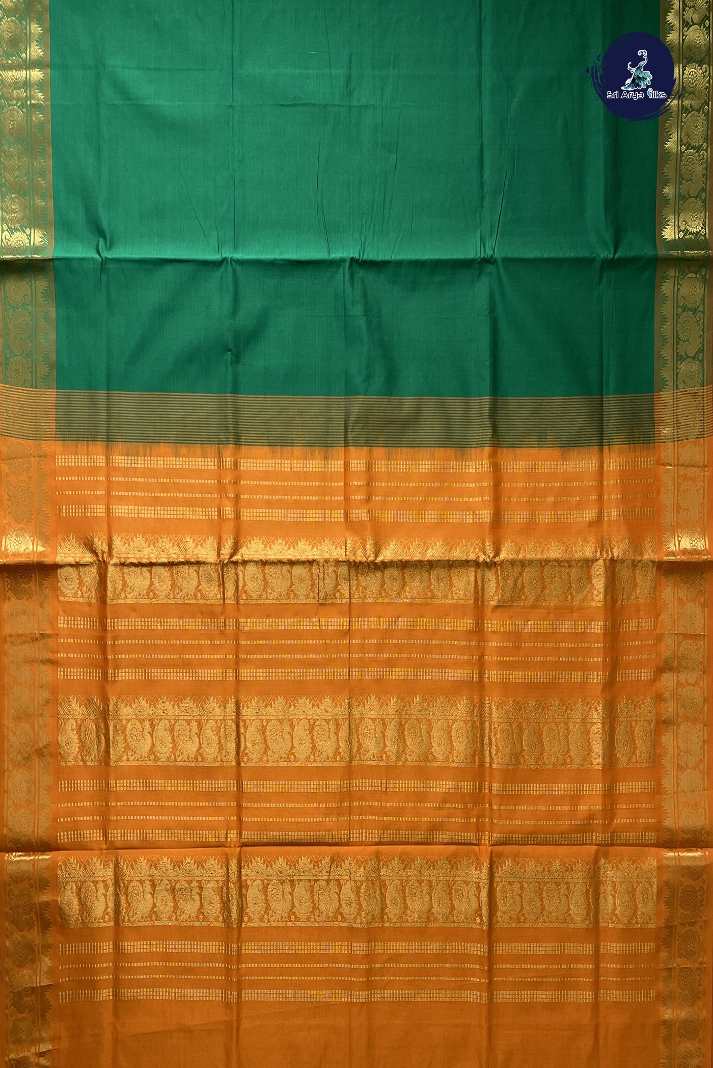 Dark Green Semi Silk Cotton Saree With Plain Pattern