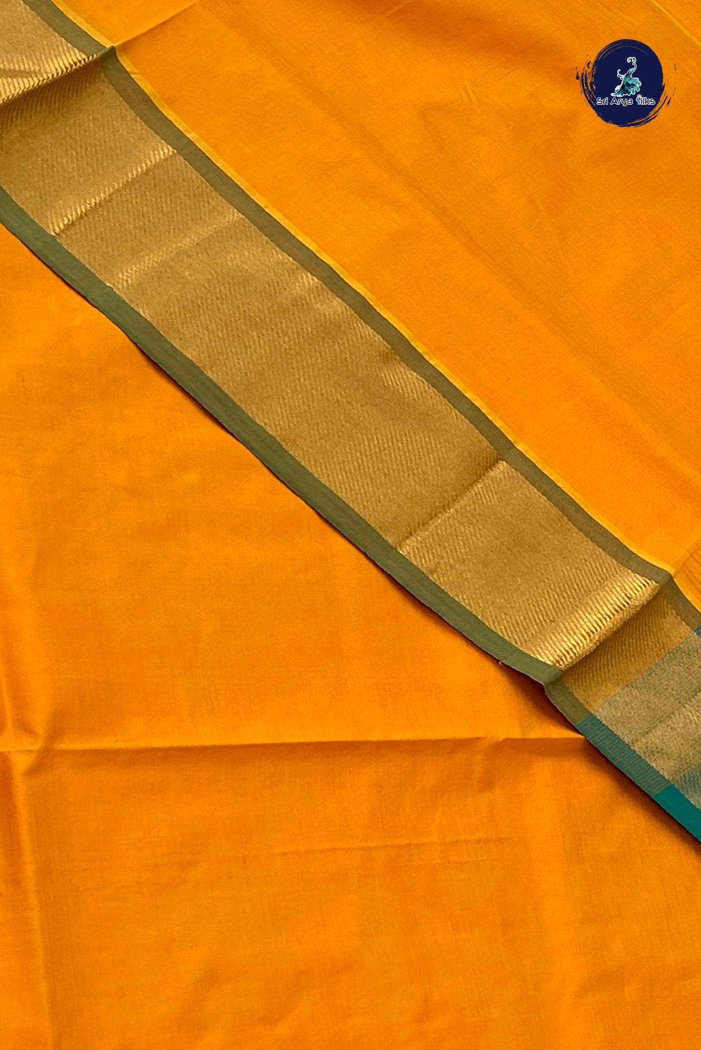 Turmeric Yellow Semi Silk Cotton Saree With Plain Pattern