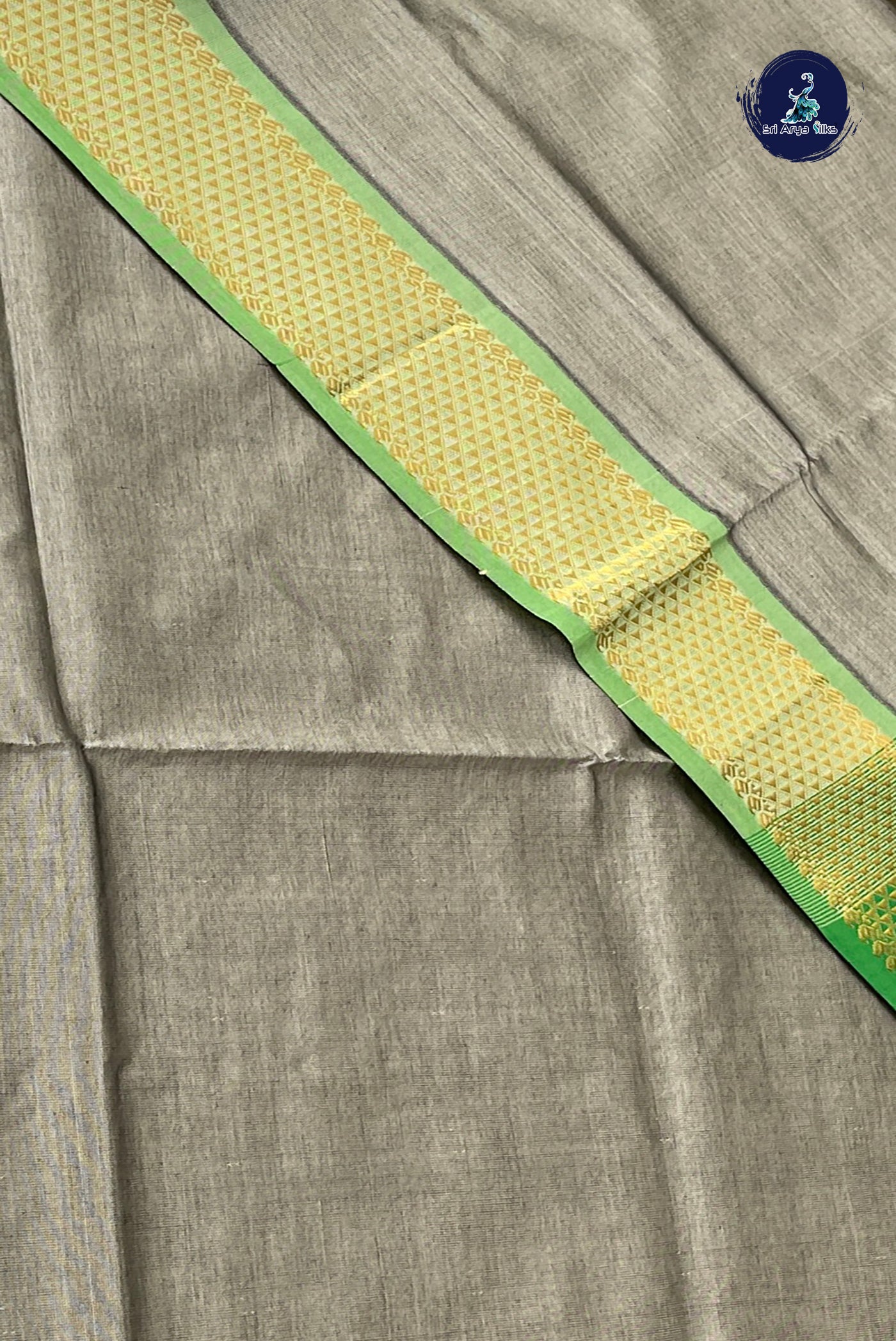 Grey Semi Silk Cotton Saree With Plain Pattern