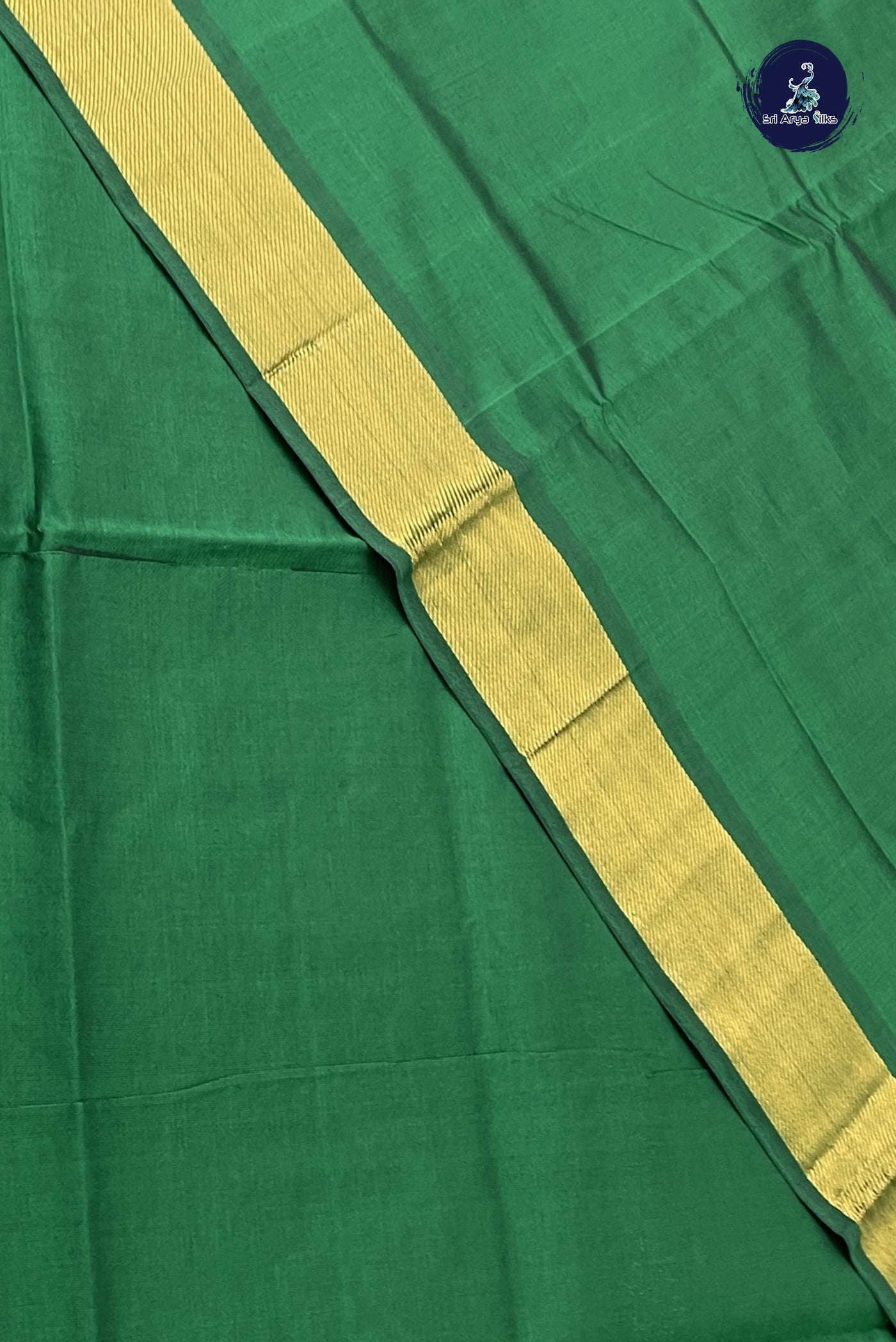 Dark Green Semi Silk Cotton Saree With Plain Pattern