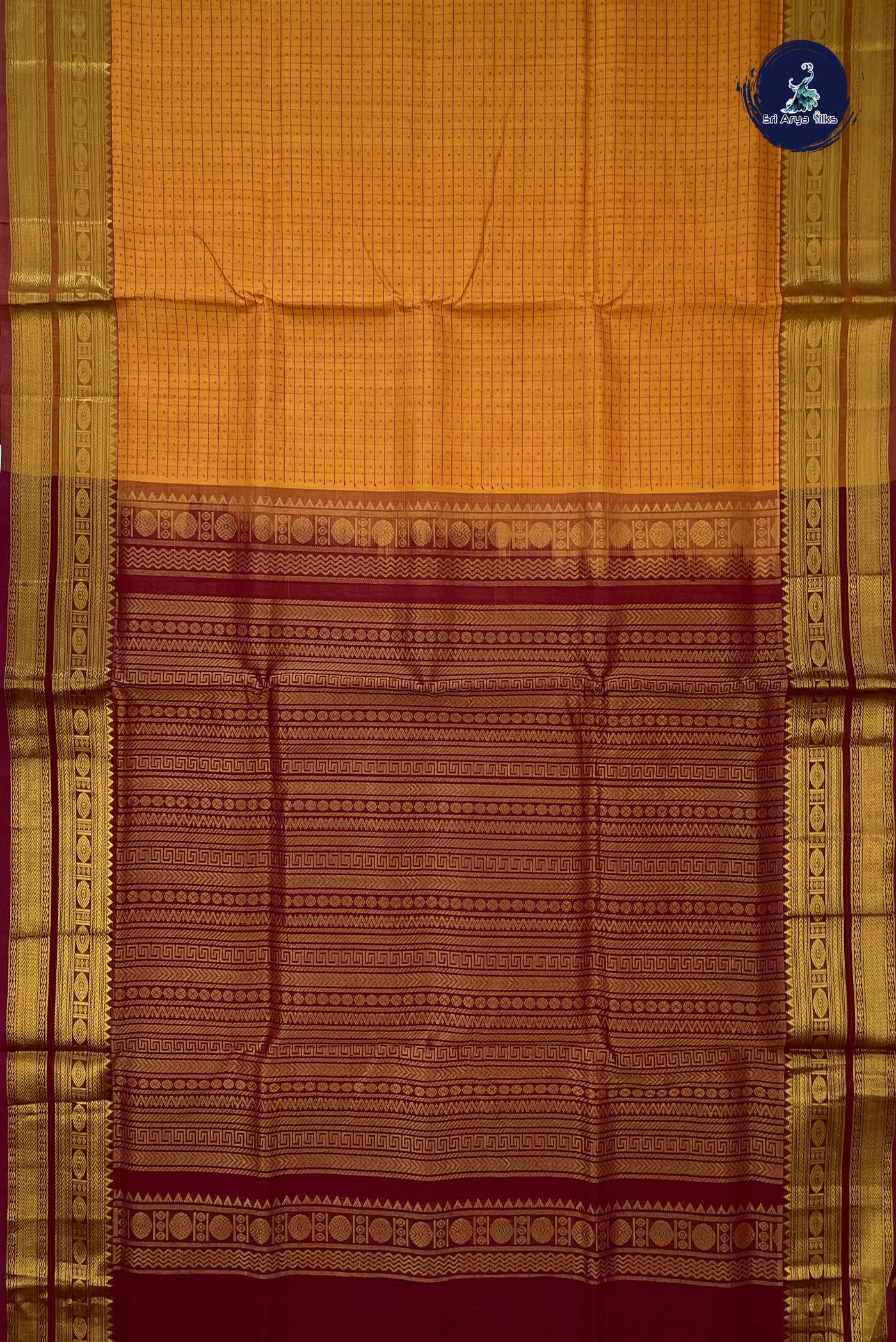 Lite Mustard Orange Bridal Silk Cotton Saree With Laksha Deepam Design Pattern