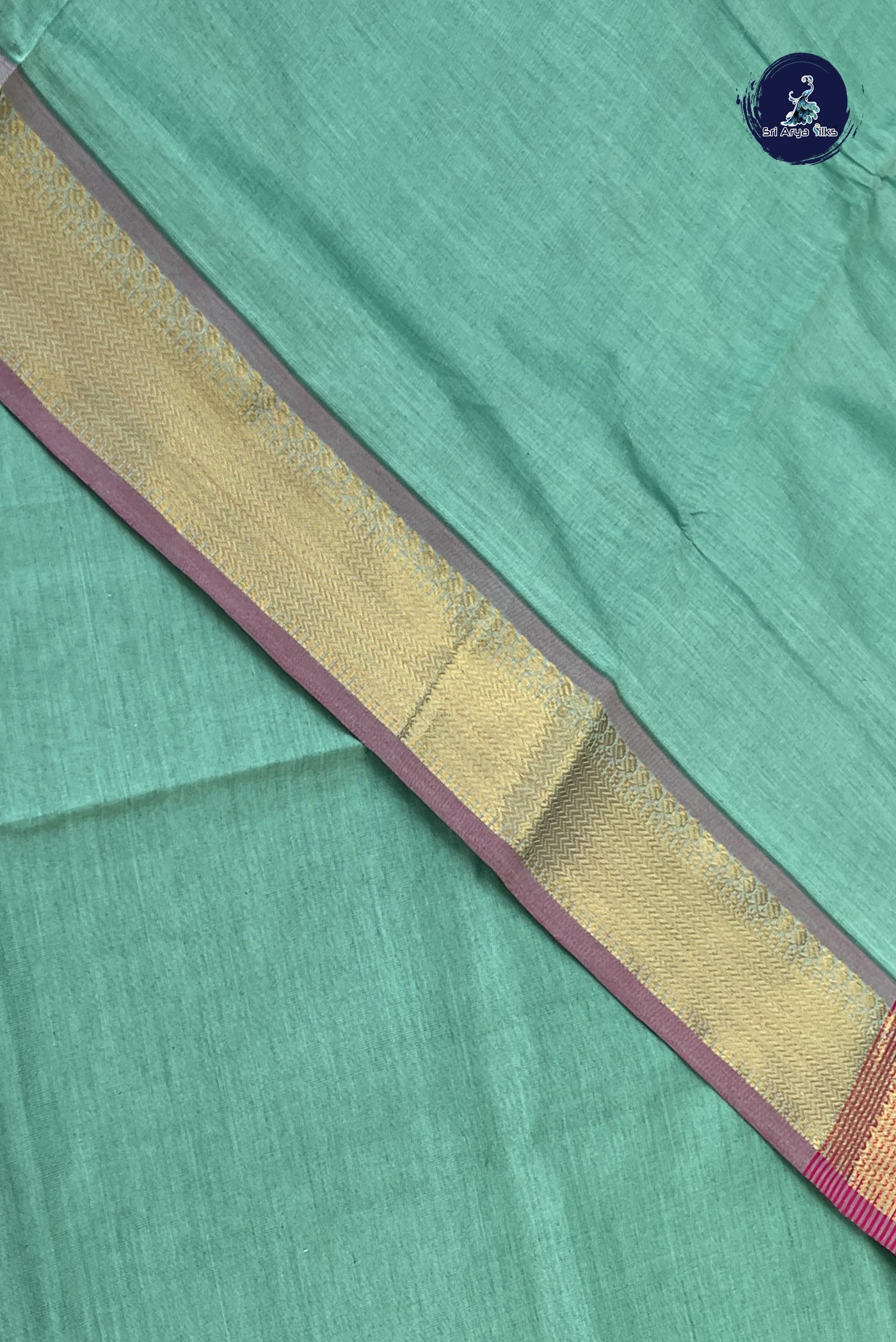 Sea Green Semi Silk Cotton Saree With Plain Pattern