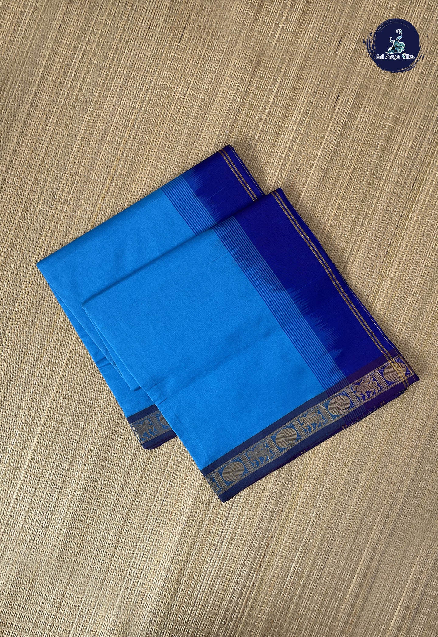 Copper Sulphate Blue Semi Silk Cotton Saree With Plain Pattern
