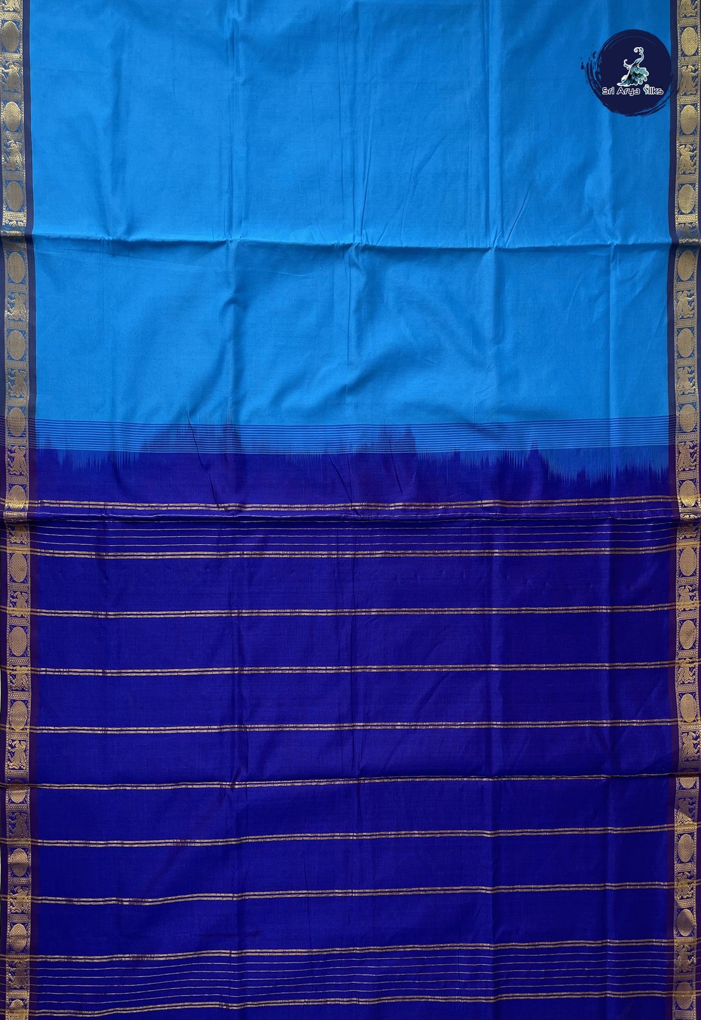 Copper Sulphate Blue Semi Silk Cotton Saree With Plain Pattern