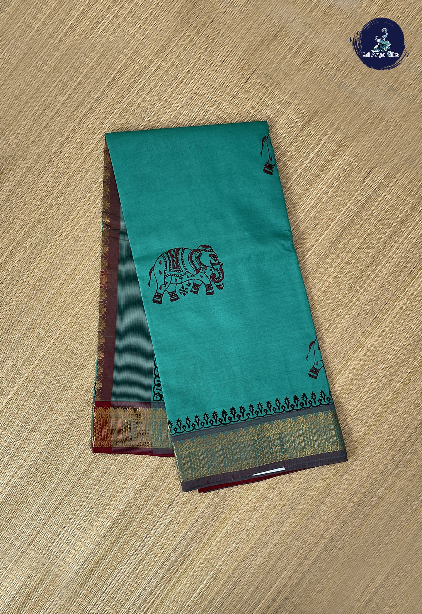 Teal Semi Silk Cotton Saree With Printed Pattern