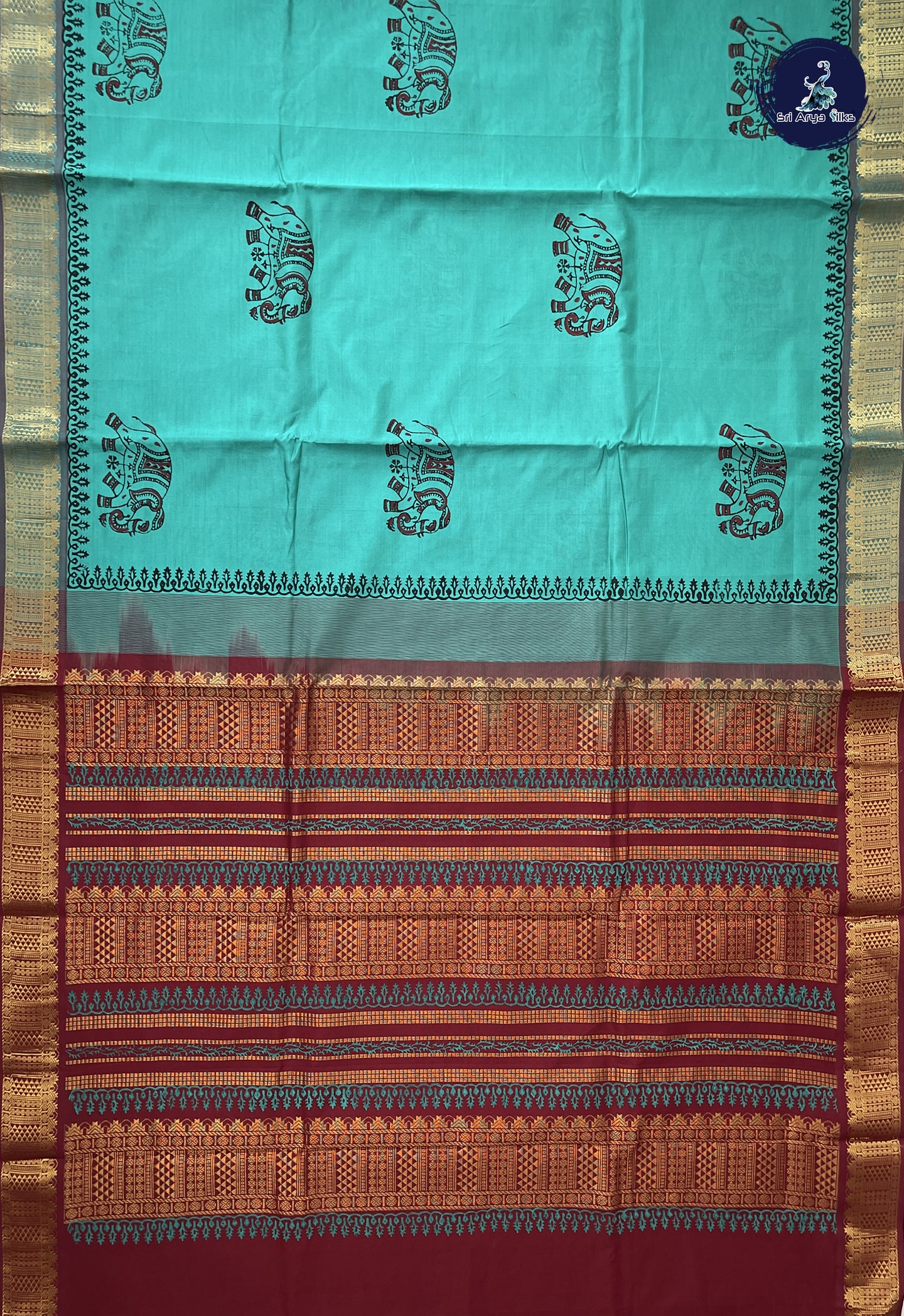 Teal Semi Silk Cotton Saree With Printed Pattern