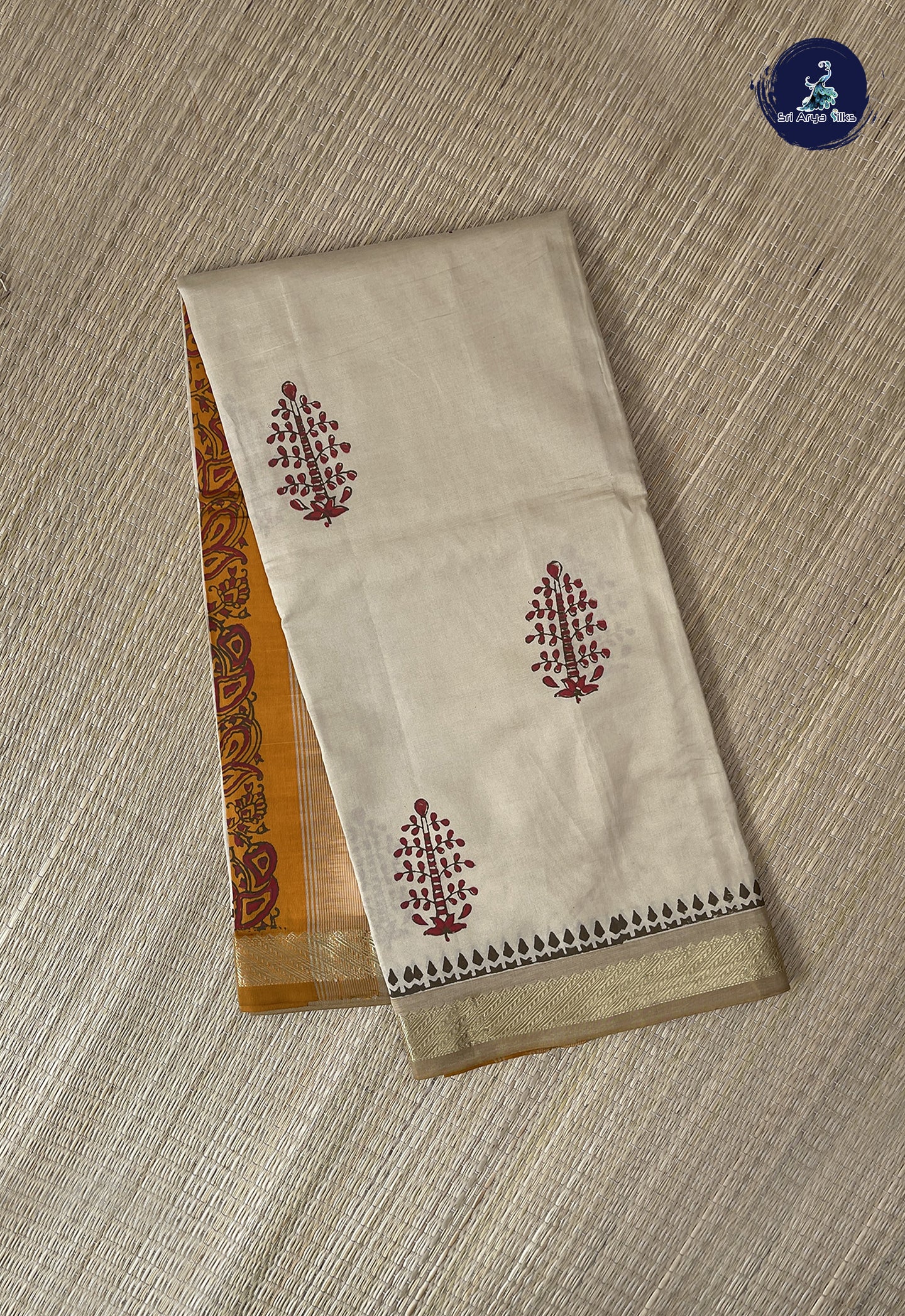 Cream Semi Silk Cotton Saree With Printed Pattern