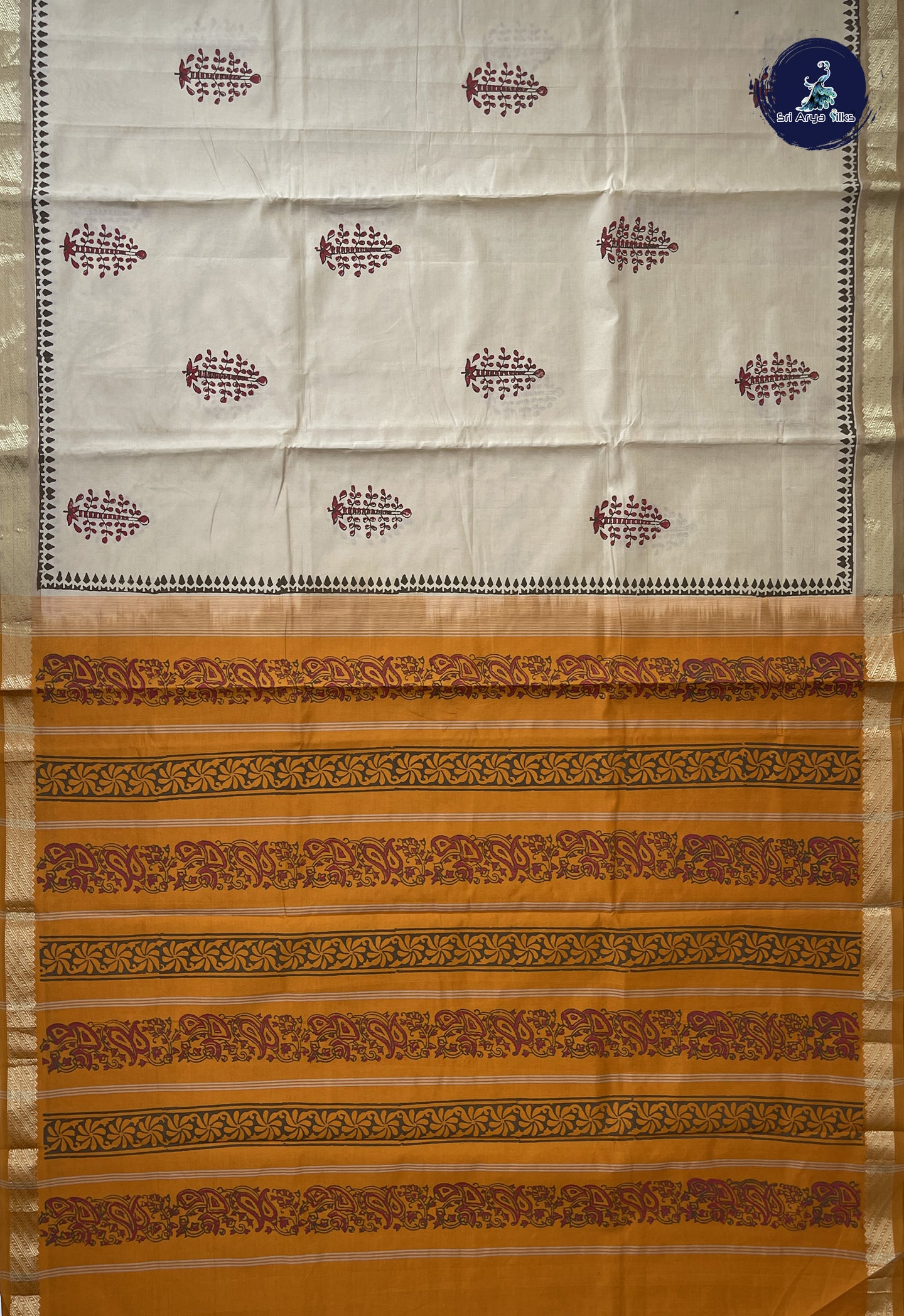 Cream Semi Silk Cotton Saree With Printed Pattern