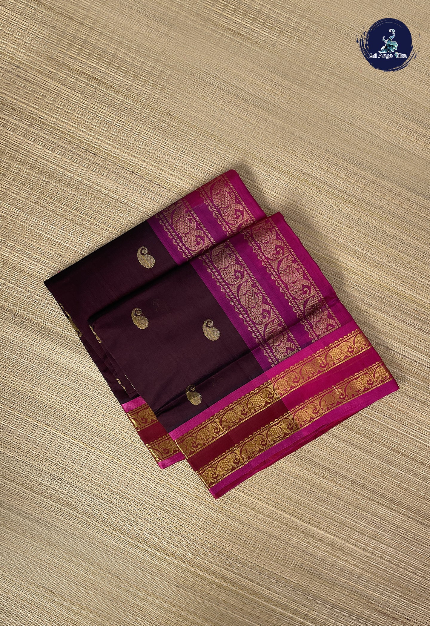Brown Simple Silk Cotton Saree With Zari Buttas Pattern