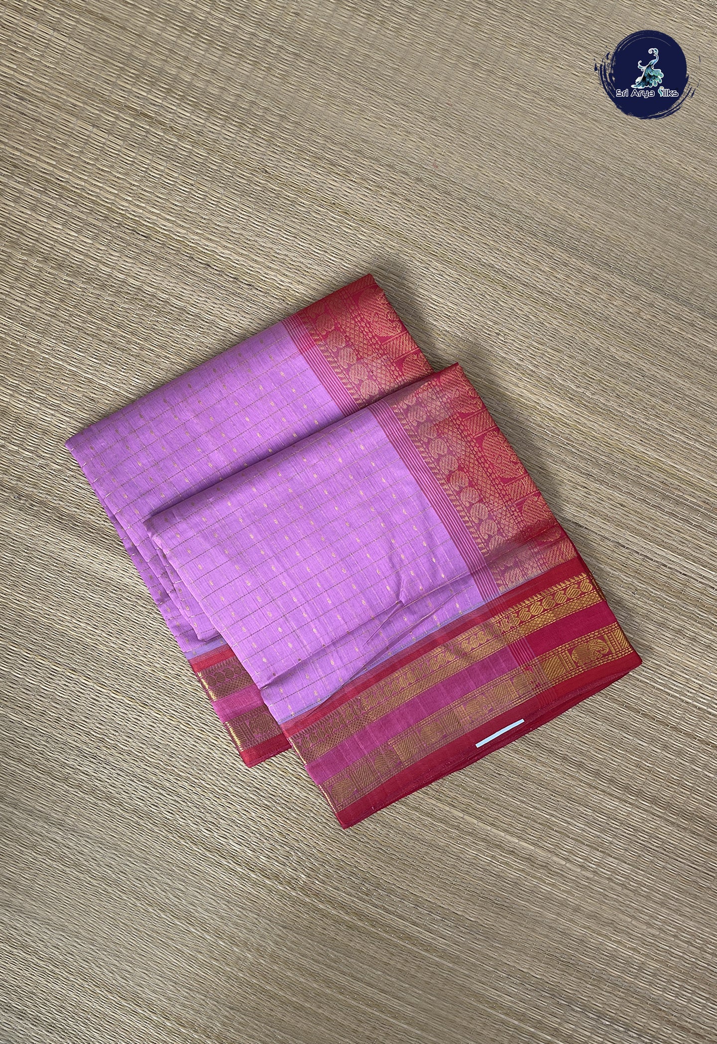 Light Pink Checked Saree With Laksha Deepam Design Pattern