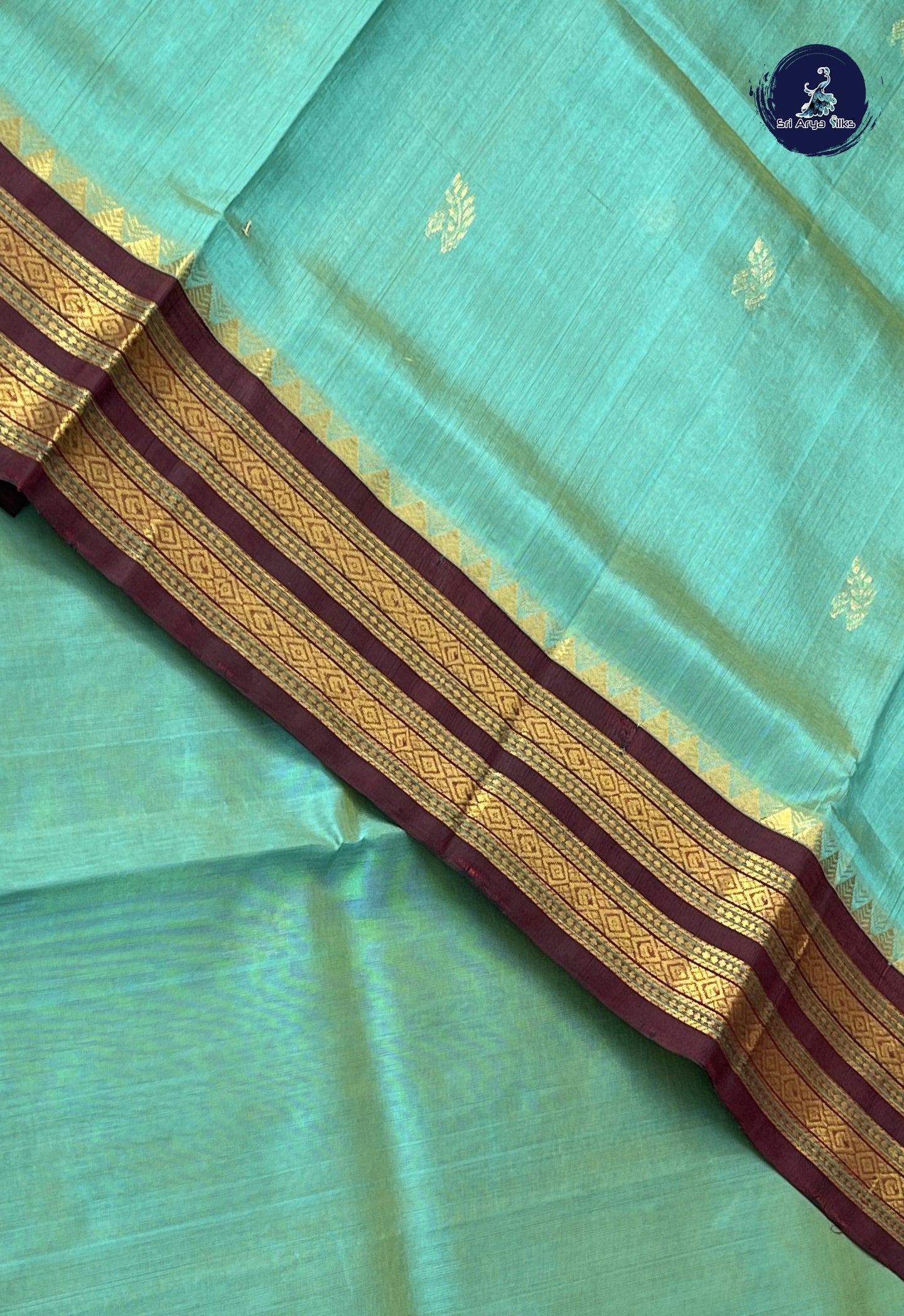 Teal Korvai Silk Cotton Saree With Zari Buttas Pattern
