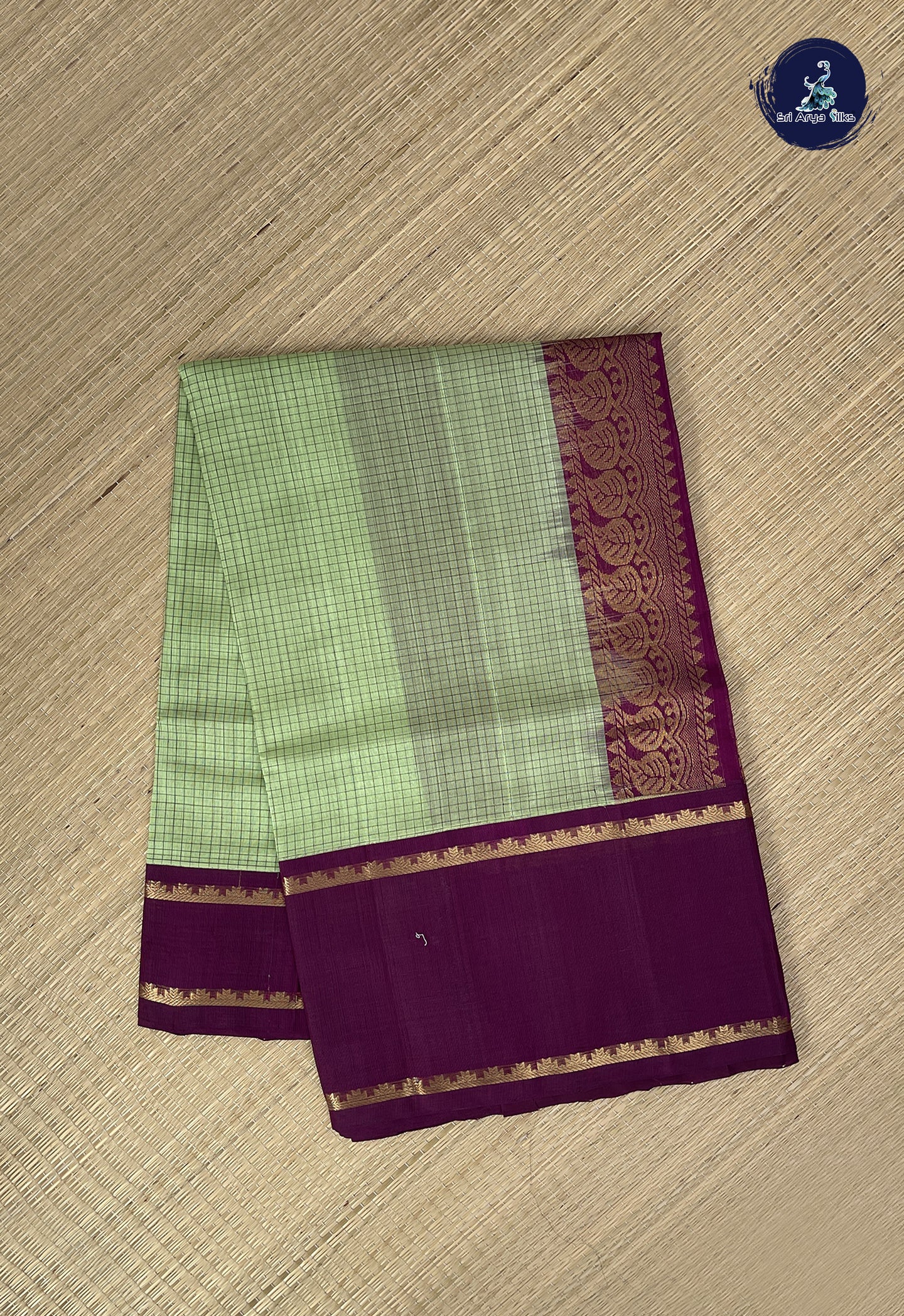 Pista Green Checked Saree With Checked Pattern