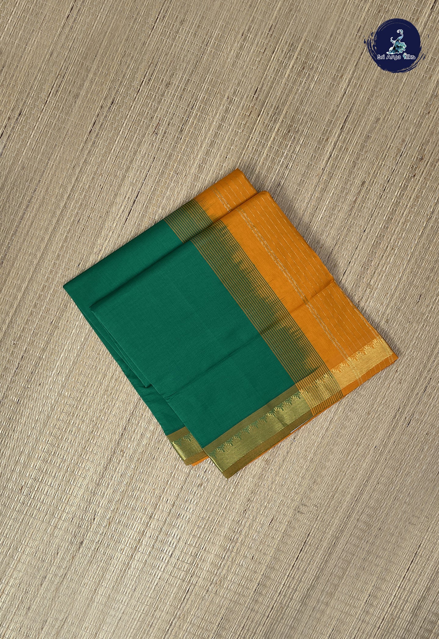 Green Kanchi Semi Silk Cotton Saree With Plain Pattern