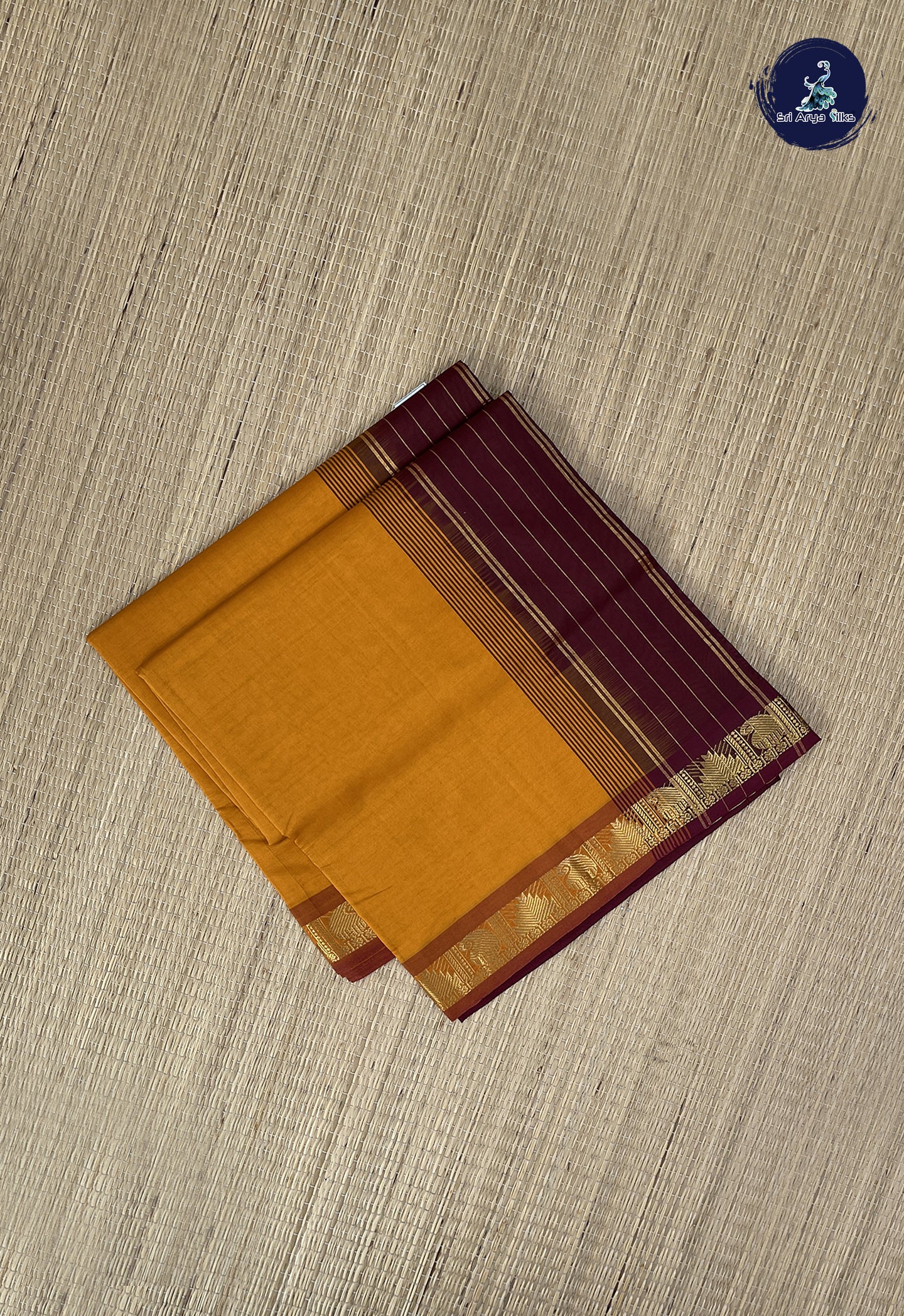 Turmeric Yellow Kanchi Semi Silk Cotton Saree With Plain Pattern