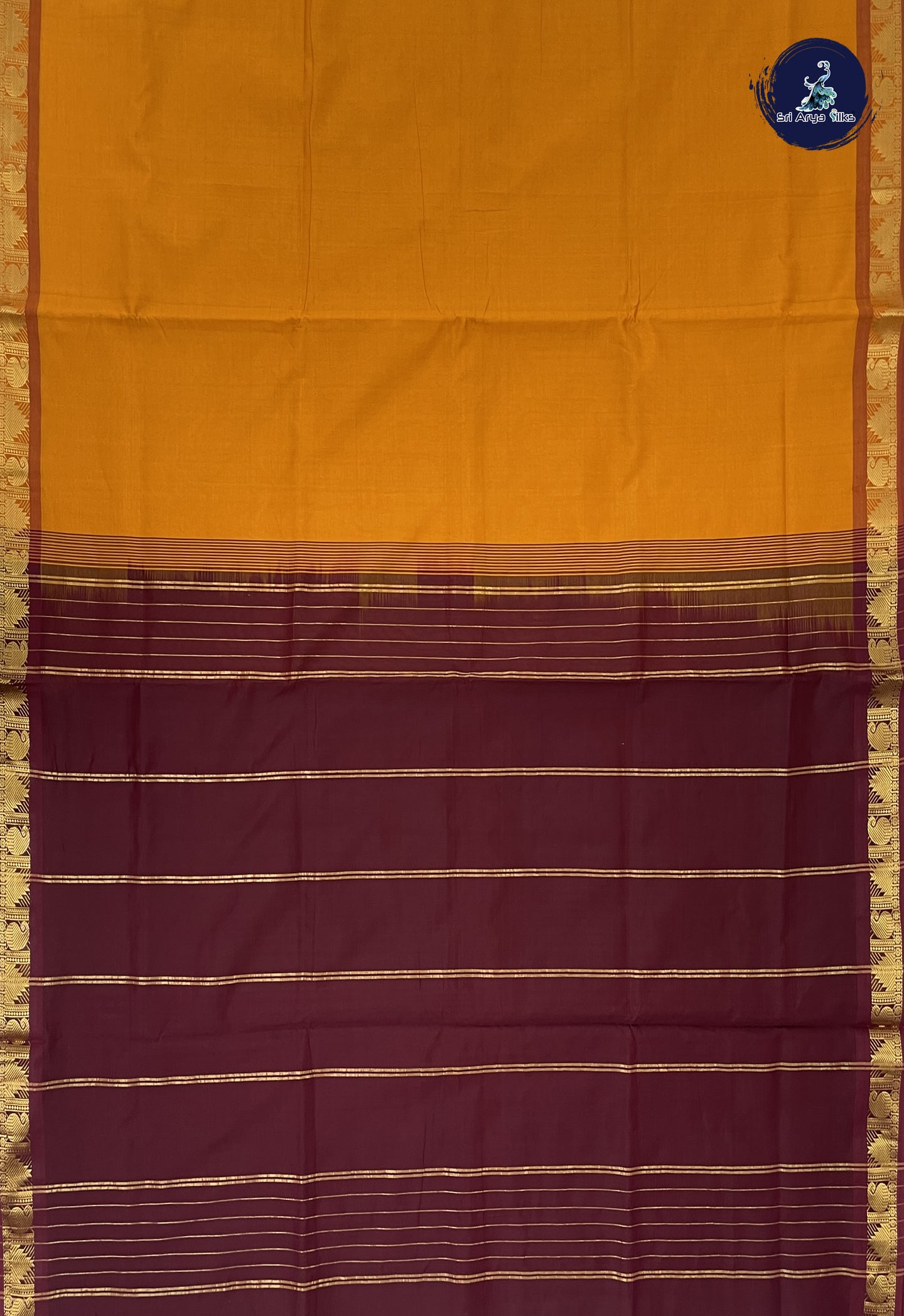 Turmeric Yellow Kanchi Semi Silk Cotton Saree With Plain Pattern