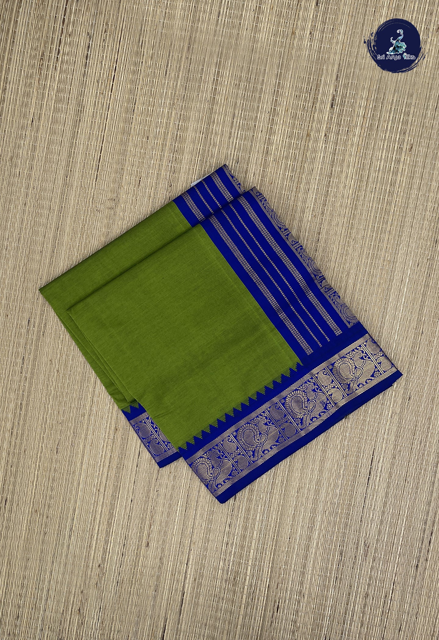 Green Kanchi Semi Silk Cotton Saree With Plain Pattern