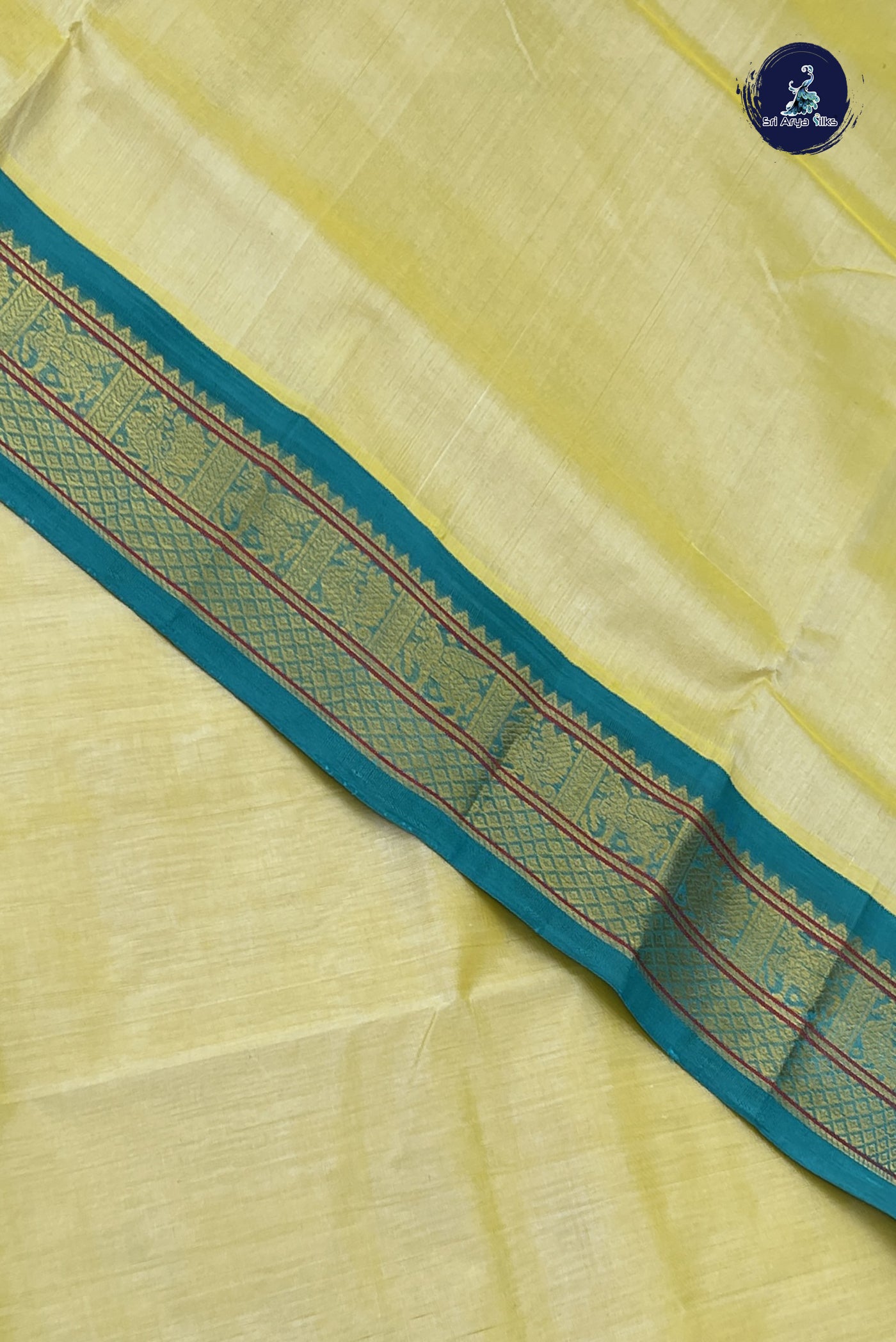 Creamish Yellow Korvai Silk Cotton Saree With Plain Pattern