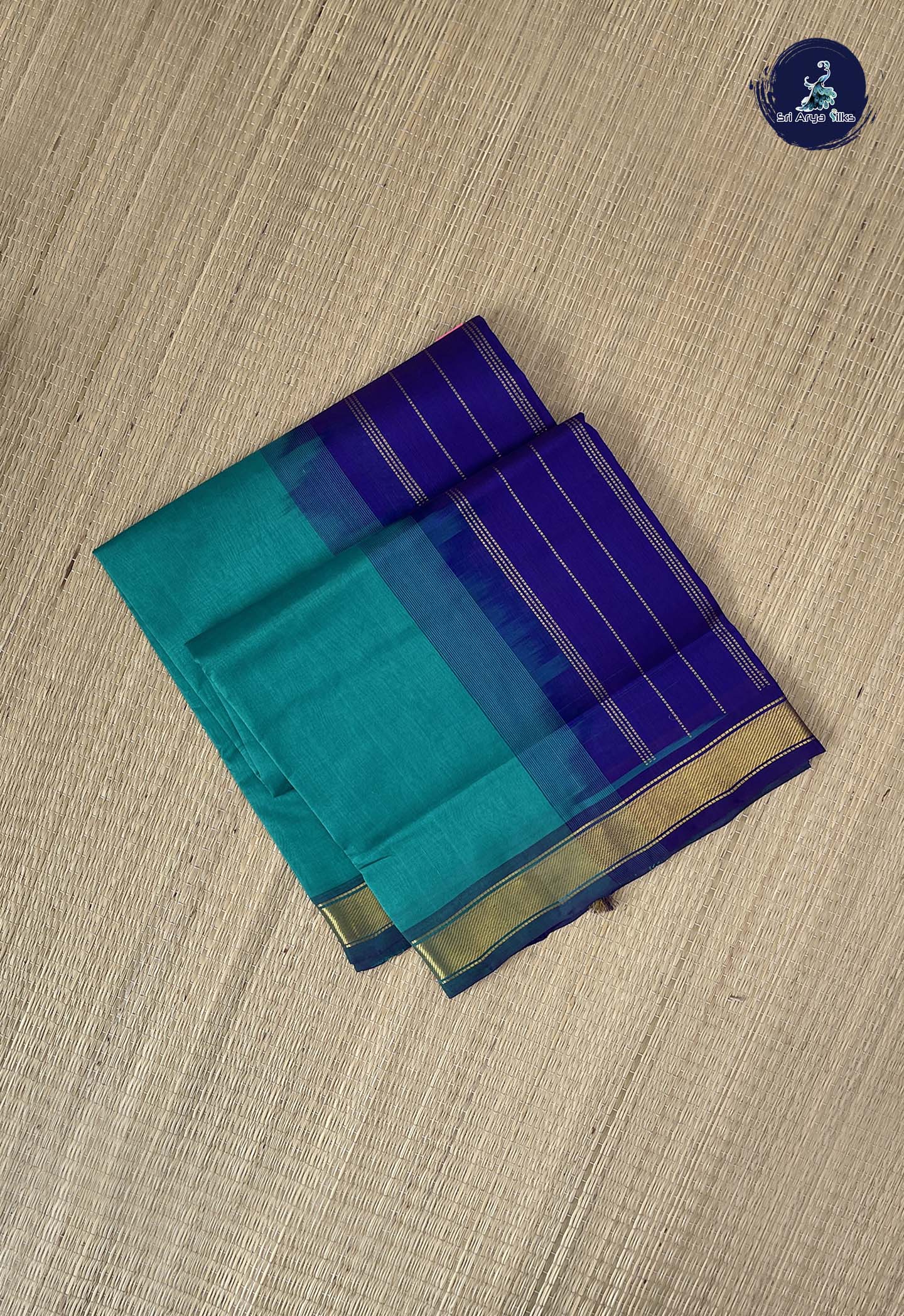 Teal Simple Silk Cotton Saree With Plain Pattern