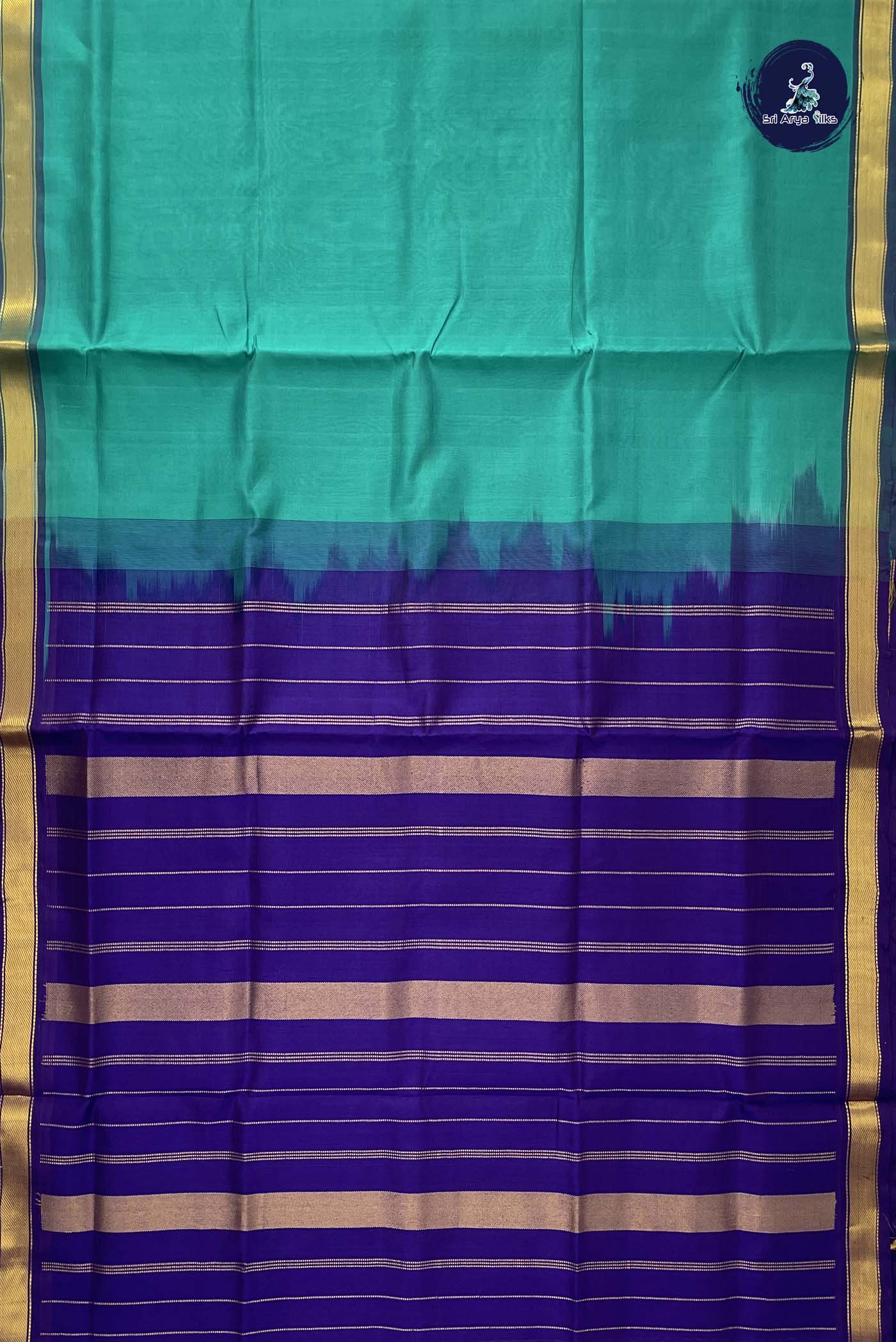 Teal Simple Silk Cotton Saree With Plain Pattern